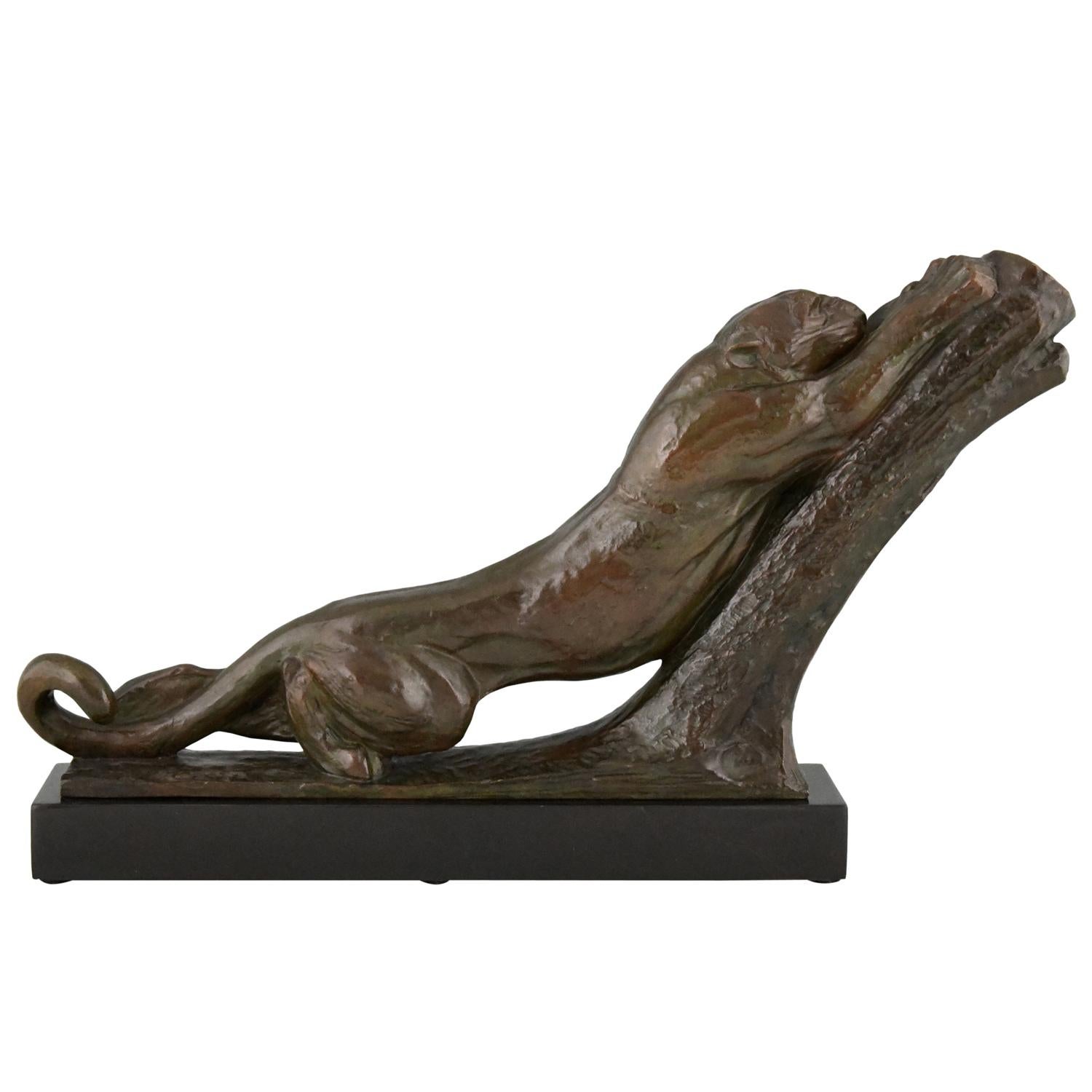 Spectacular Art Deco bronze of a panther strechting. 
By the well known French sculptur Andre Vincent Bequerel.
The bronze has a beautiful patina and stands on a Belgian black marble base. 
Signed and with the Les Neveux de Lehmann foundry