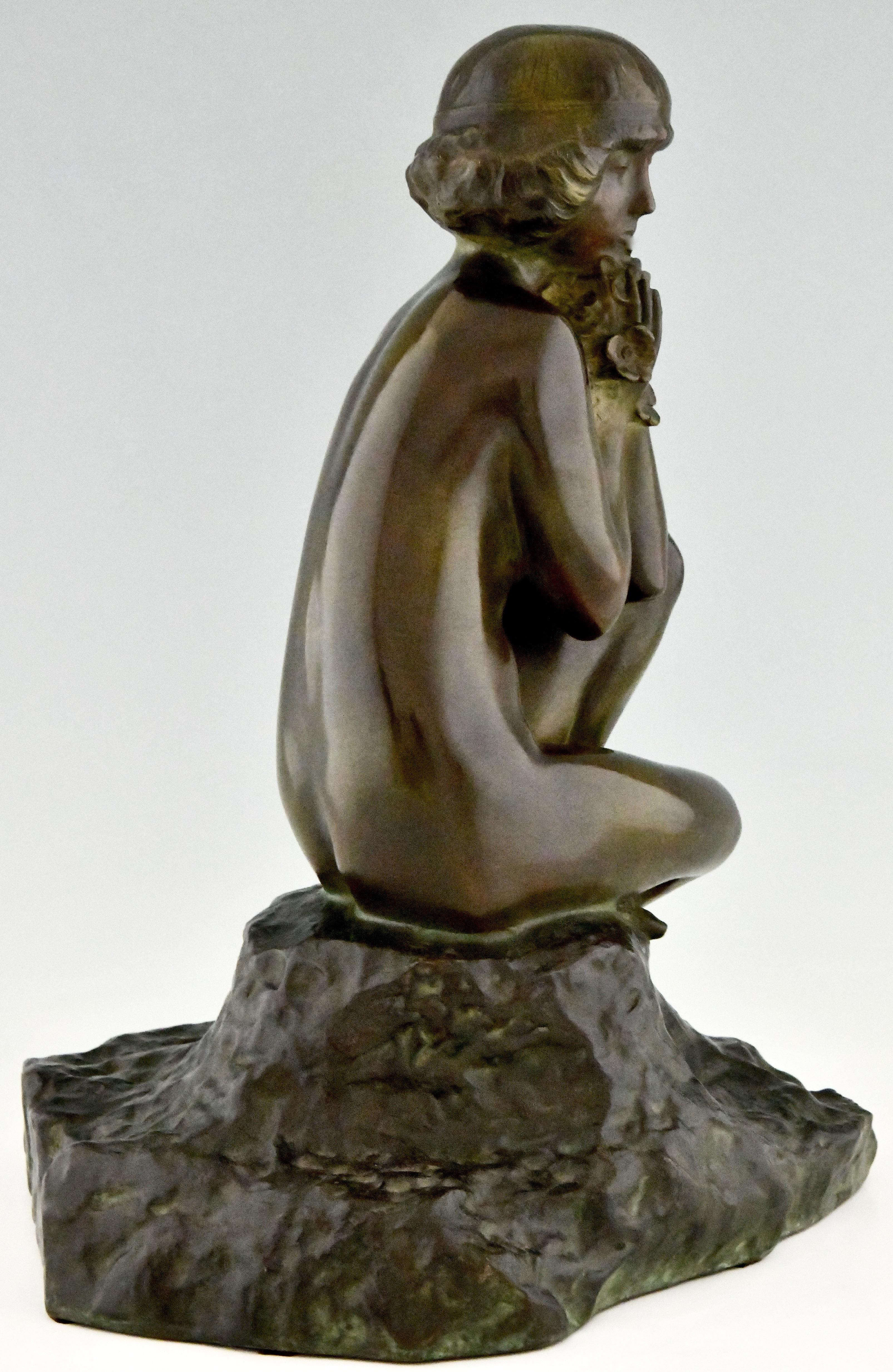 Patinated Art Deco Bronze Sculpture Seated Nude with Flowers by Real Del Sarte, 1920 For Sale
