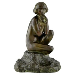 Art-Déco-Bronzeskulptur „Sitzender Akt mit Blumen“ von Real Del Sarte, 1920