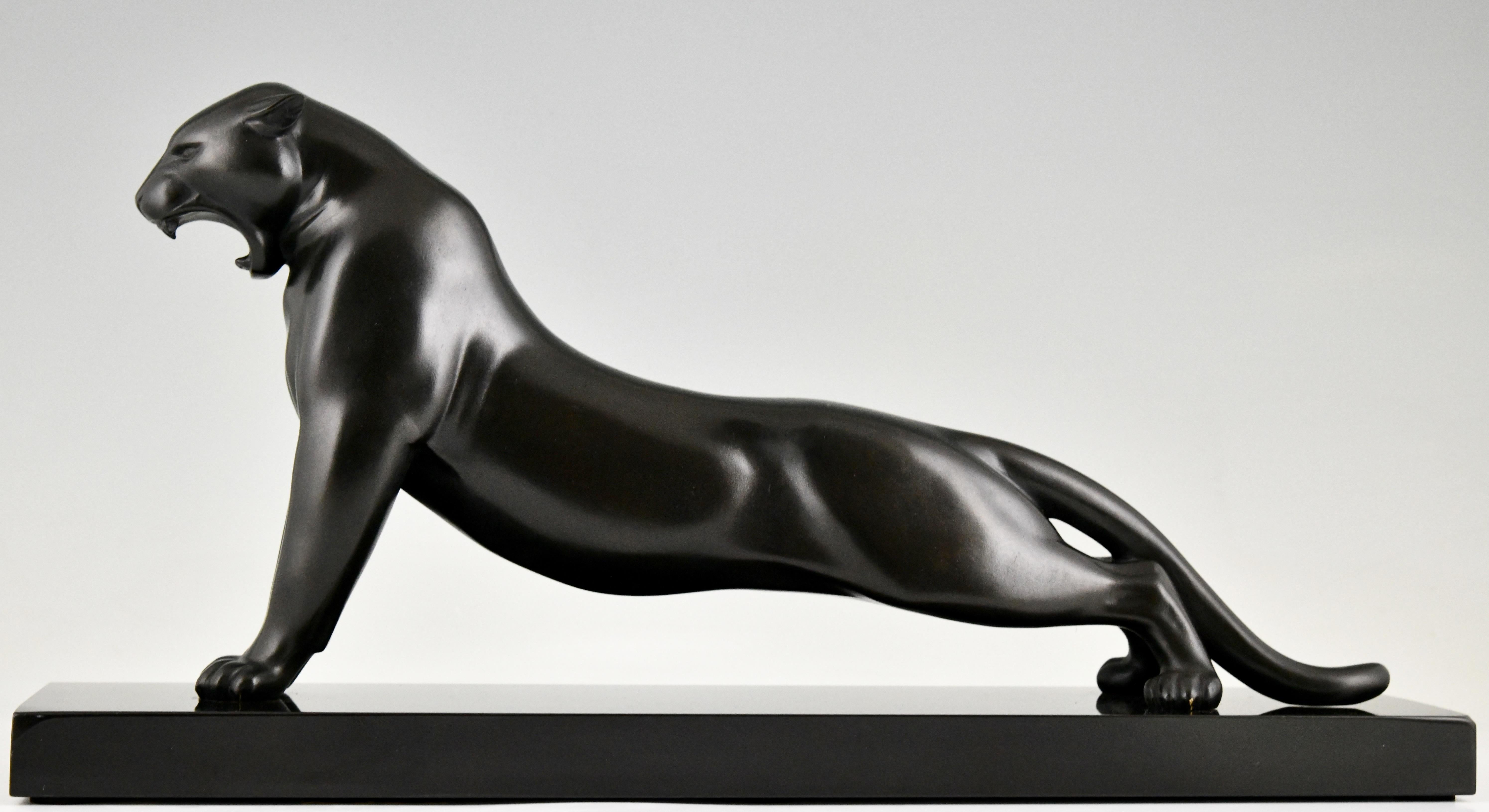 Art Deco bronze sculpture stretching panther by Emile Louis Bracquemond
The sculpture has a black patina and stands on a Belgian Black marble base. 
France 1925.