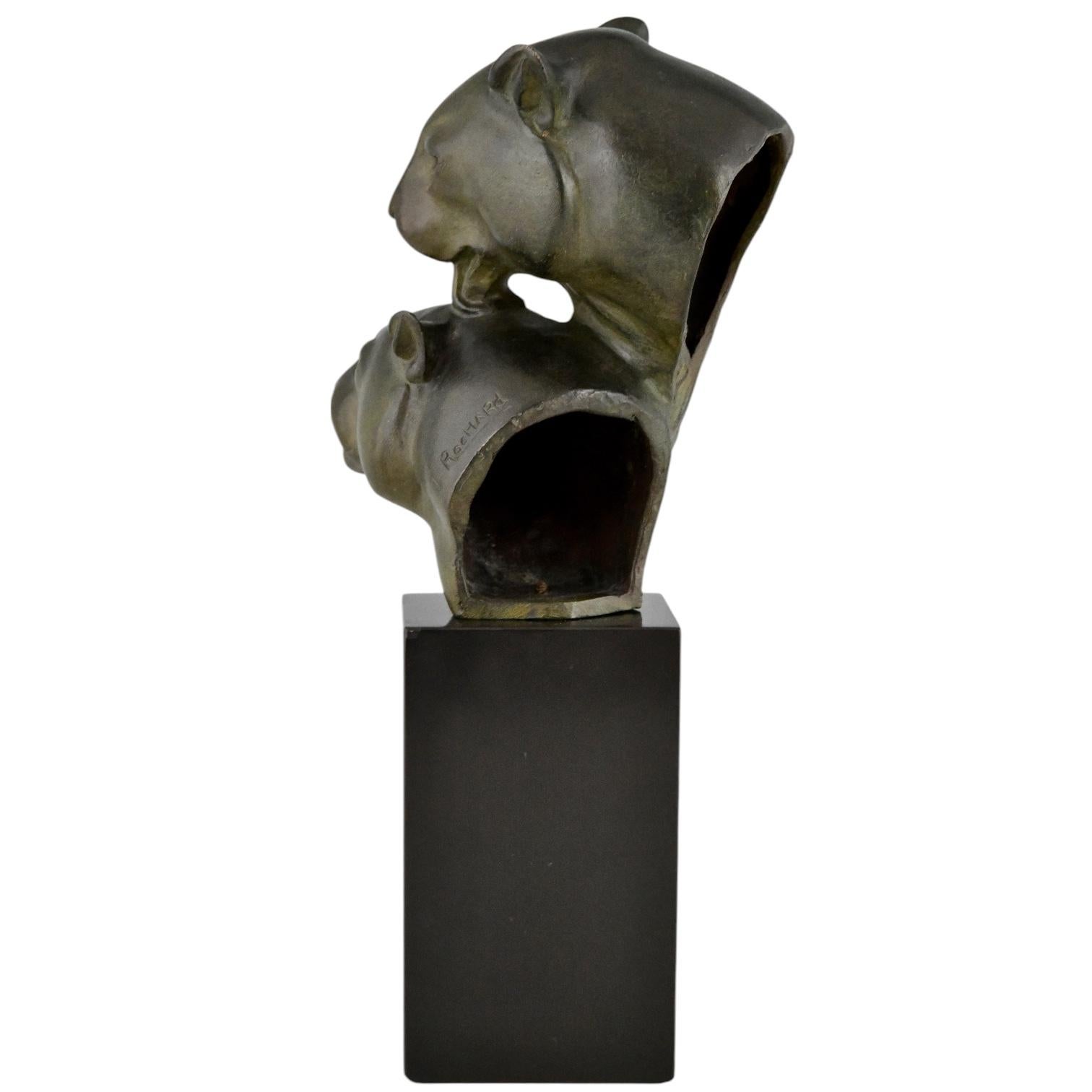 Patinated Art Deco bronze sculpture two panther heads by Irenee Rochard, France 1930. For Sale