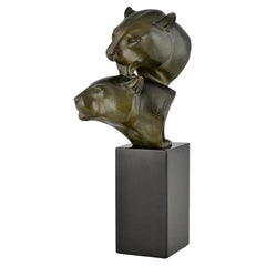 Escultura Art Déco de bronce dos cabezas de pantera de Irenee Rochard, Francia 1930.