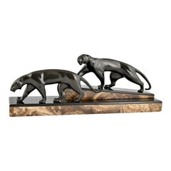 Bronzeskulptur zweier Panther im Art déco-Stil, signiert von Michel Decoux 1920