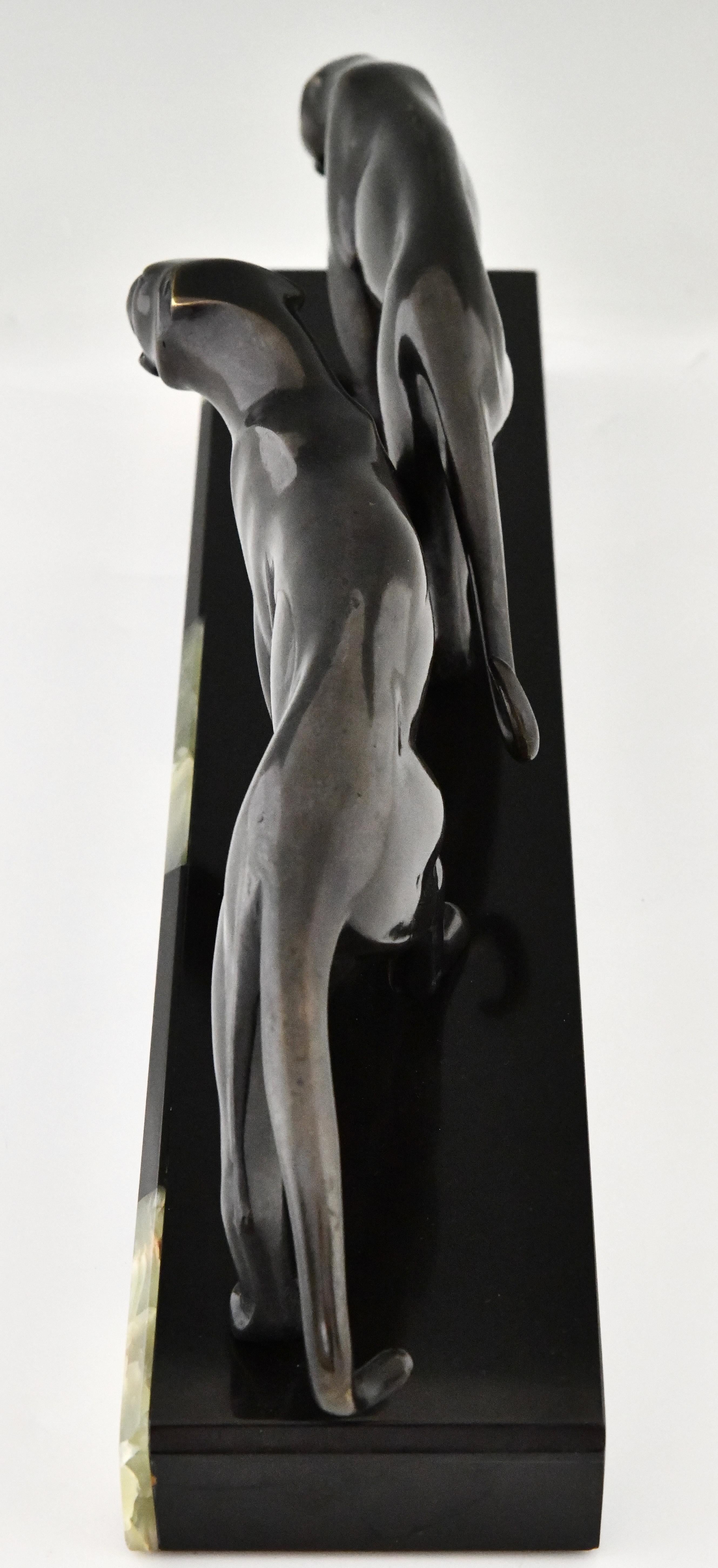 Bronzeskulptur zweier Panther im Art déco-Stil, signiert von Michel Decoux 1920 im Angebot 4