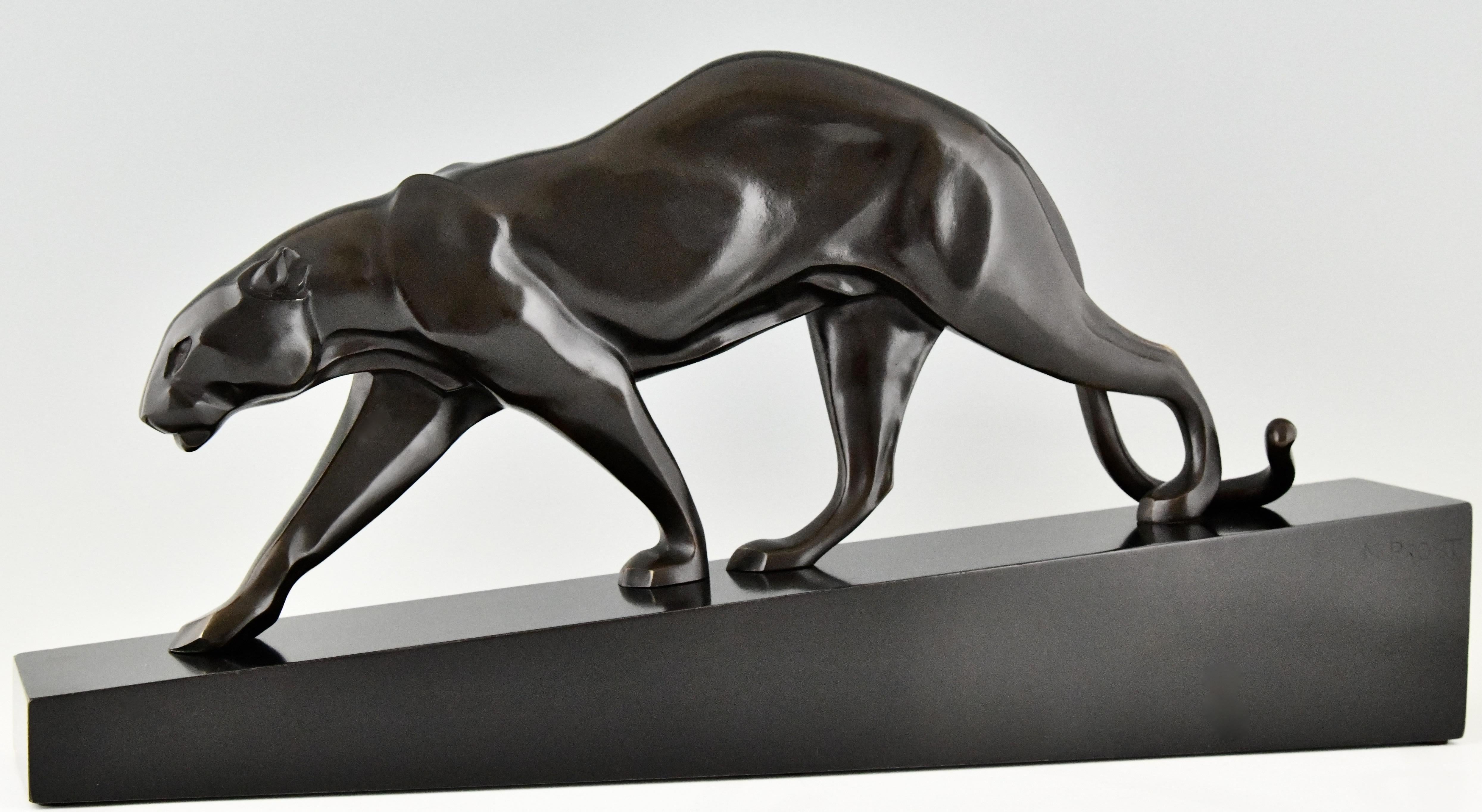 Beautiful bronze Art Deco sculpture of a walking panther on a Belgian black marble base. 
Signed by Maurice Prost with Susse Freres founders' signature. 
France ca. 1935. 
Literature: 
This bronze is illustrated in “Art Bronzes” by Michael