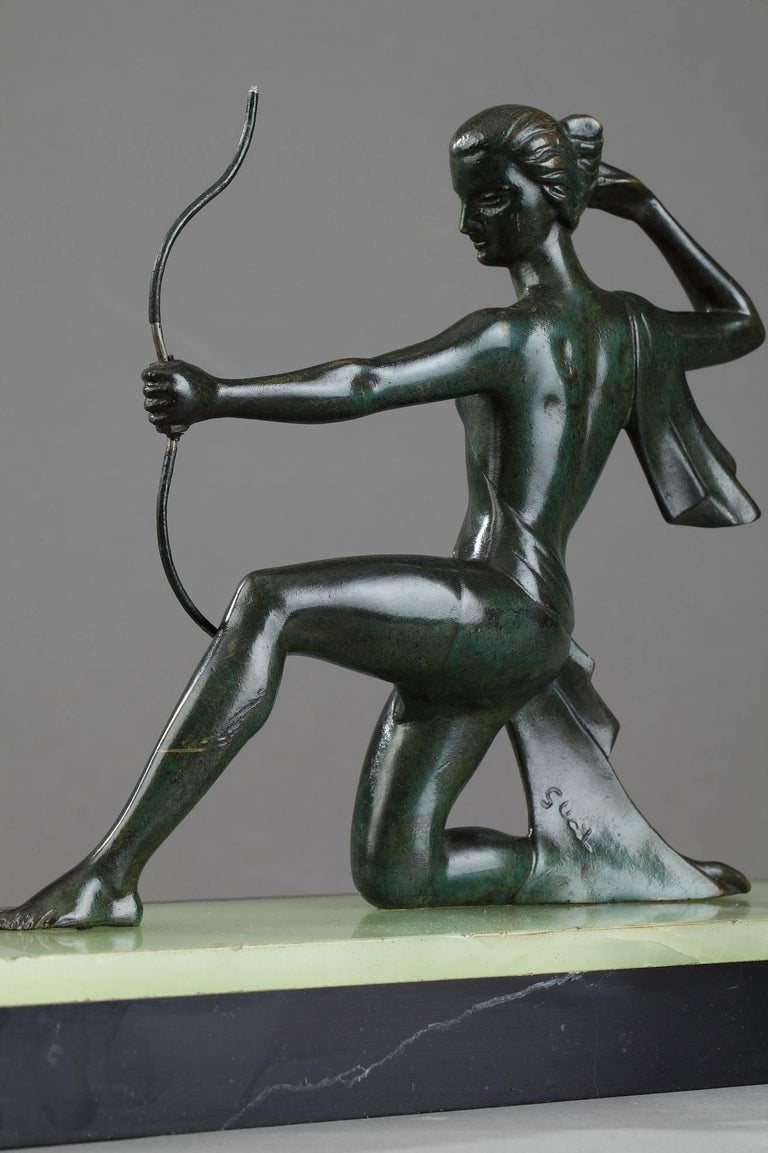 Art Deco Bronze Sculpture "Woman with a Bow" by Gual at 1stDibs