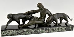 Sculpture de femme avec panthères Art déco signée Michel Decoux 1920