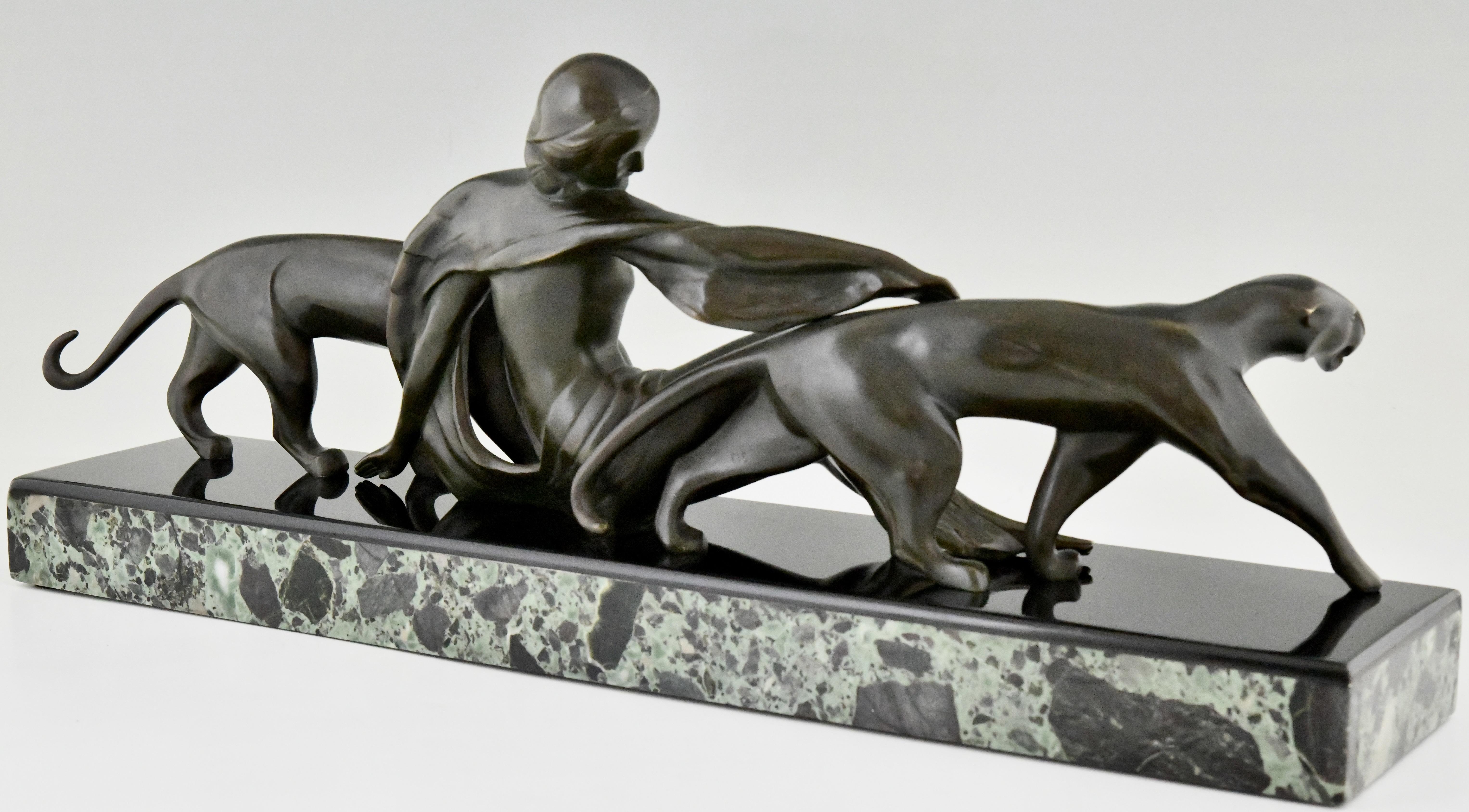 Patinated Art Deco bronze sculpture woman with panthers signed by Michel Decoux 1920 For Sale