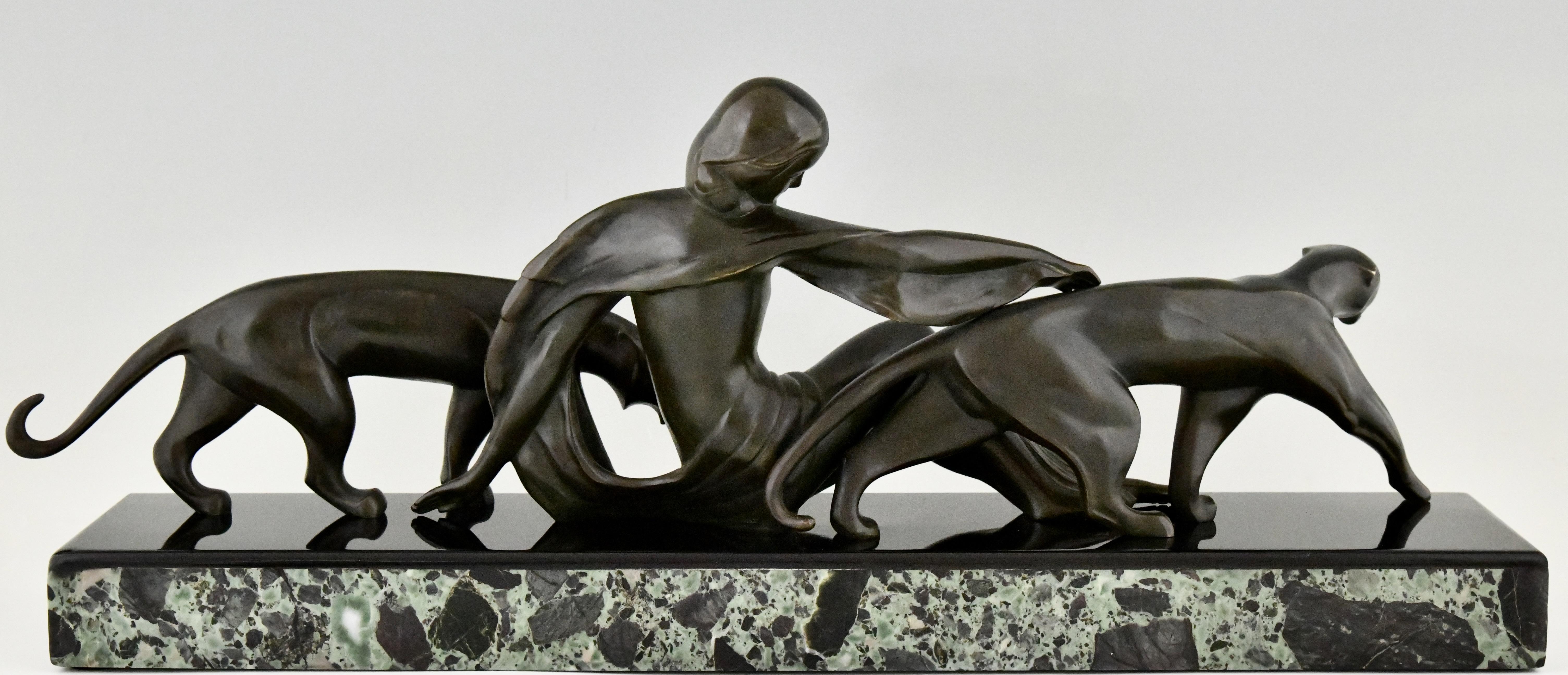 Early 20th Century Art Deco bronze sculpture woman with panthers signed by Michel Decoux 1920 For Sale