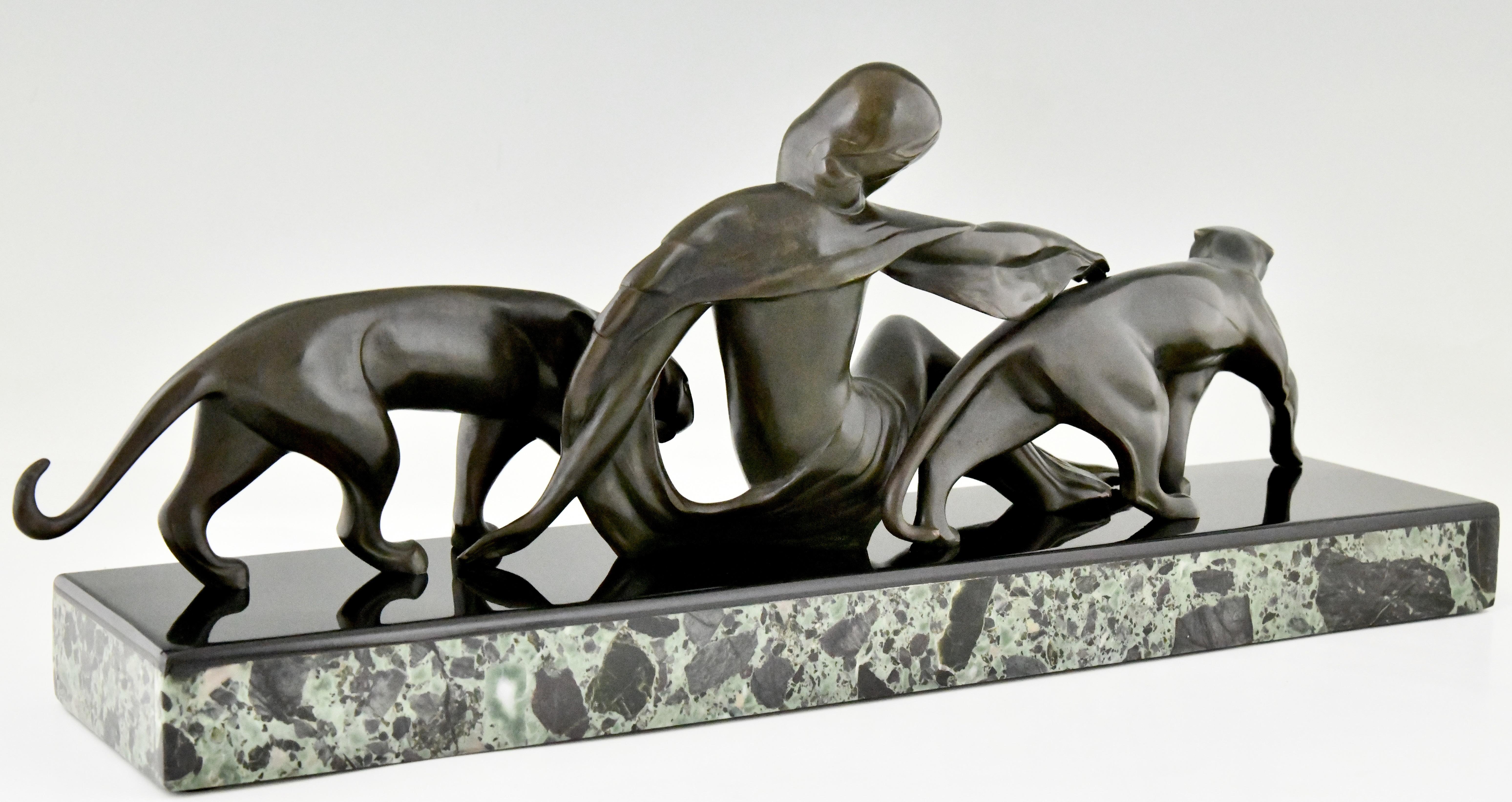 Bronze Art Deco bronze sculpture woman with panthers signed by Michel Decoux 1920