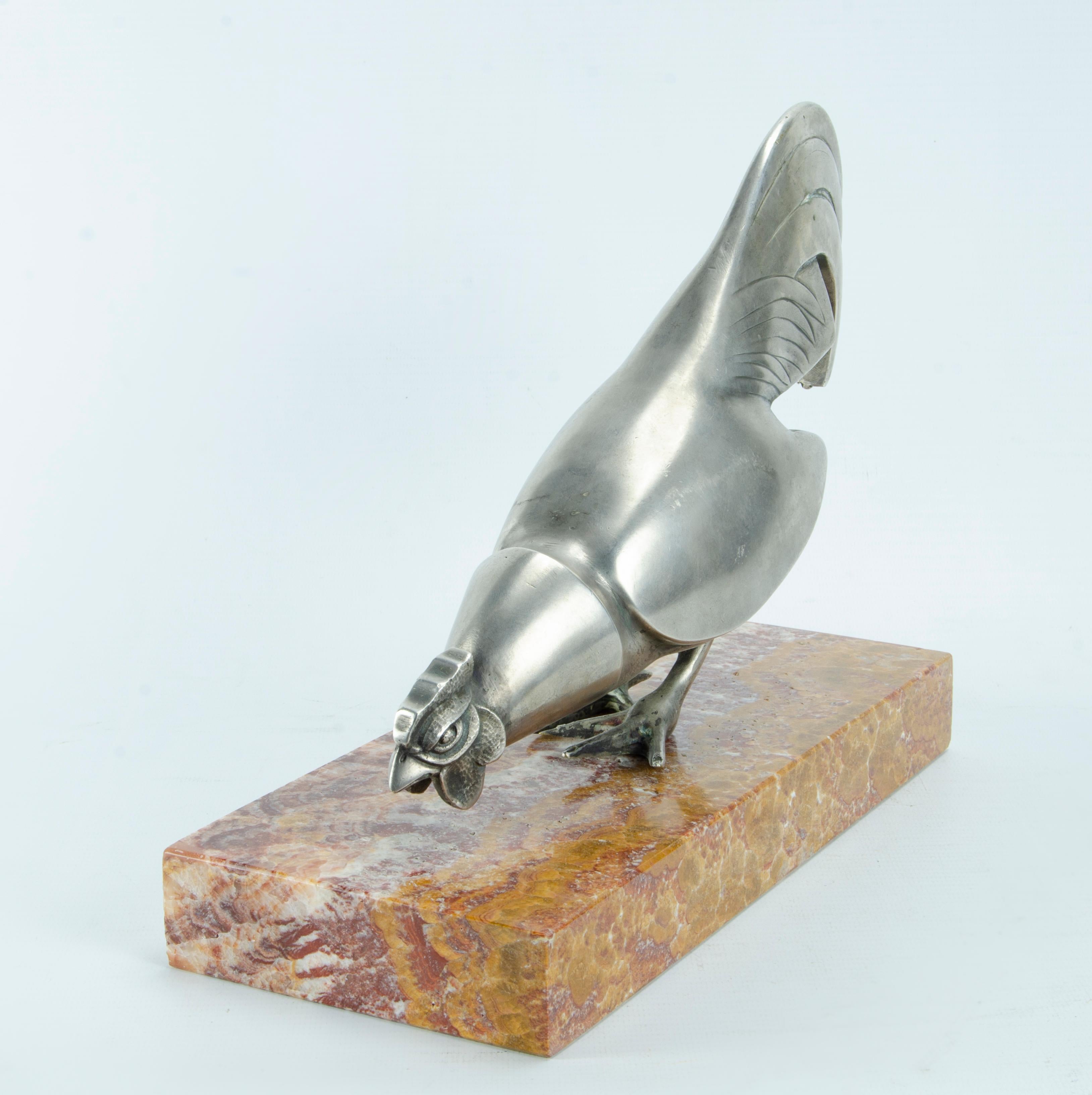 Art deco bronze silver plated rooster
Unsigned in the style of Kelety or Rochard
Onix marble base
Excellent condition
Origin France, Circa 1920.