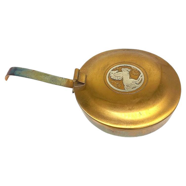What is a copper silent butler?