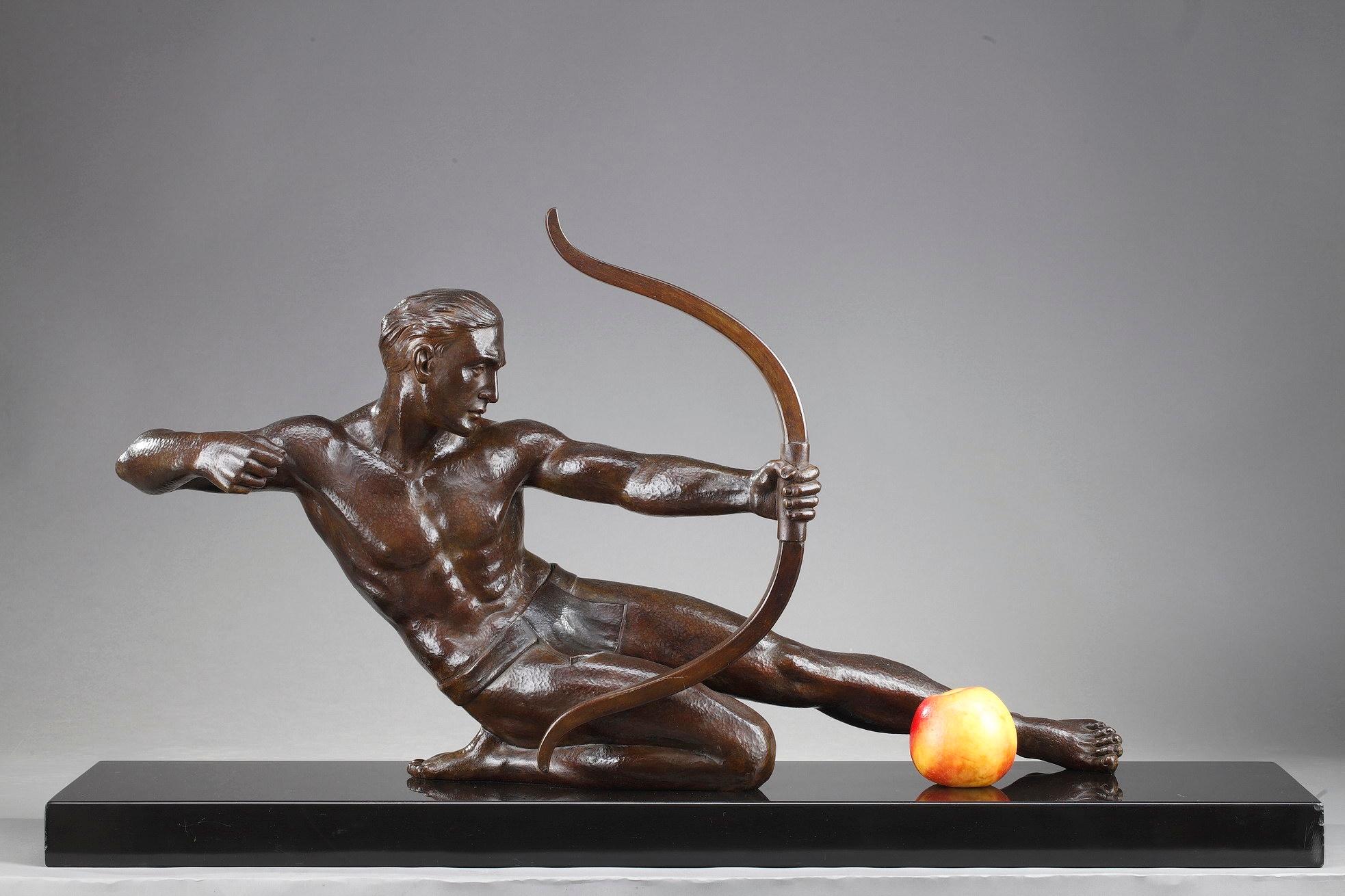 This Art Deco-era statue crafted of patinated bronze captures an archer bending his bow. The figure is rendered with an impressive tension and energy. The nude athlete inspired by the Greek sculpture, has an arm bending the bow and the right foot
