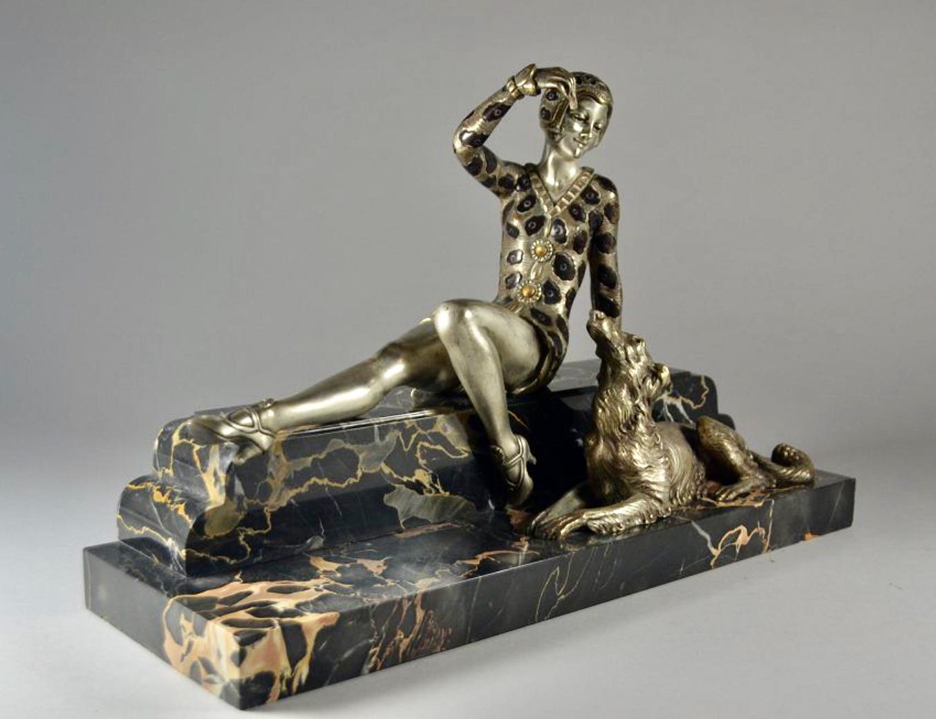 Art Deco bronze statue of woman & borzoi dog by Charles Henri Molins. Quality sculpture in silvered bronze and enamel on a portoro marble base (also signed on the base). This 1930 statue is emblematic of the Art Deco period. In the woman’s stylized