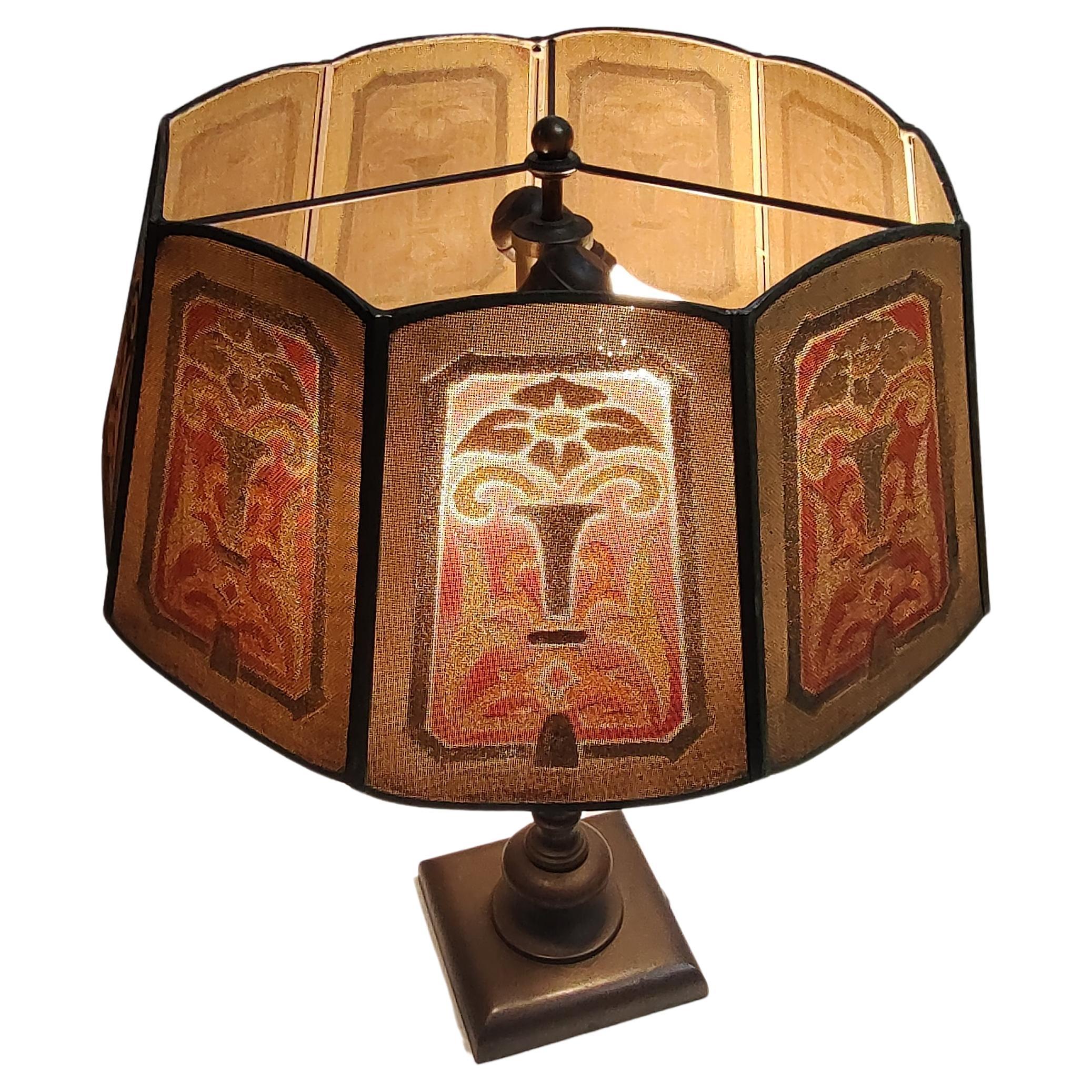 Fabulous Art Deco metal mesh lamp shade be with a geometric pattern. Possibly a Tiffany shade as they made this style of shade.  Bronze candle stick base with a double cluster socket. Some oxidation on lamp base on one side, see pic. In excellent