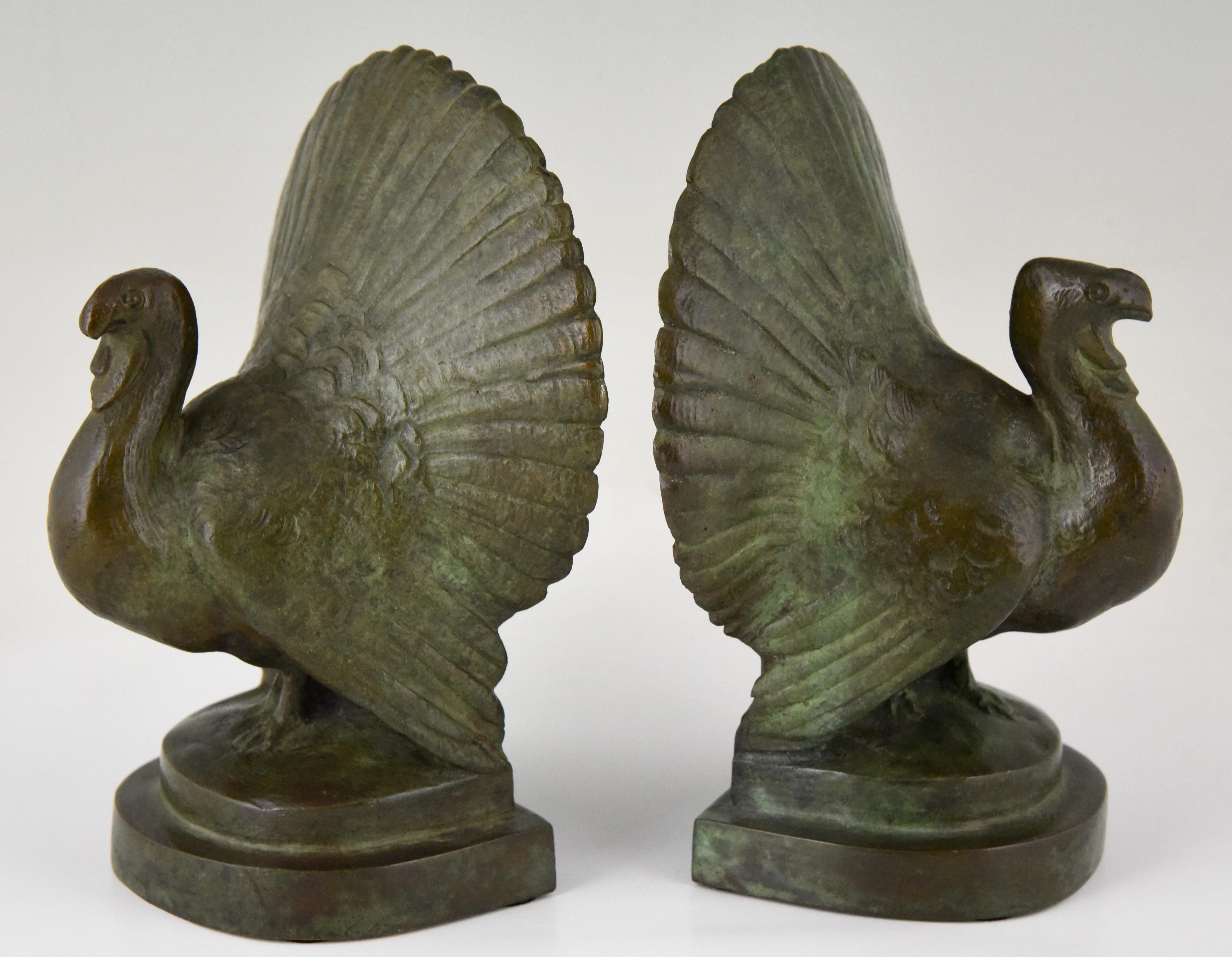 Beautiful pair of Art Deco bronze bookends modelled as turkeys with lovely dark green patina. Signed by the French artist Claude, circa 1930. 
Literture:
“Art deco sculpture” Victor Arwas, Academy.
?“Dictionnaire illustré des sculpteurs