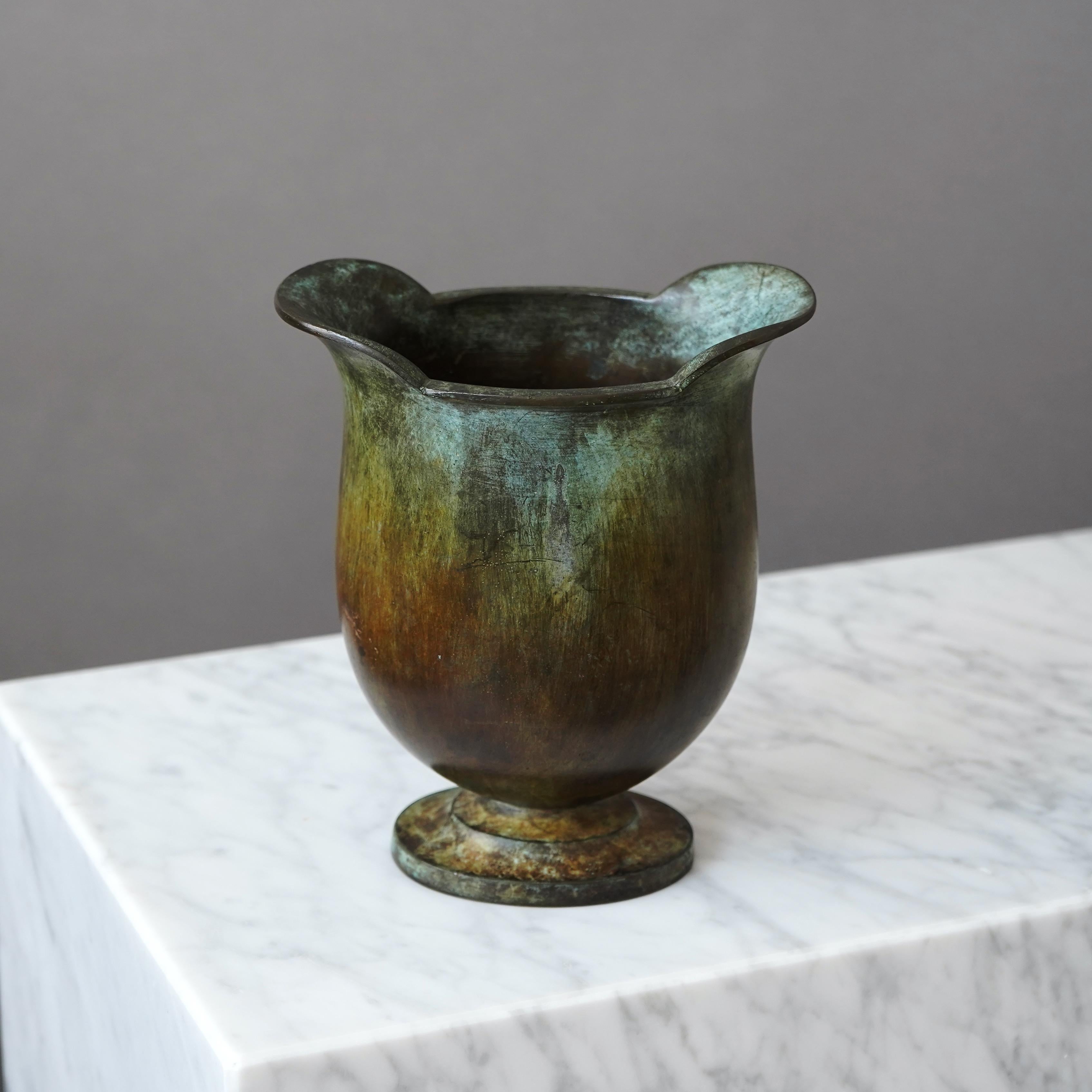 A beautiful bronze vase with amazing patina. Art Deco / Swedish Grace. 
Made by GAB Guldsmedsaktiebolaget, Sweden, 1930s.  

Great condition, with a few light scratches.
Stamped 'BRONS' and makers mark.
