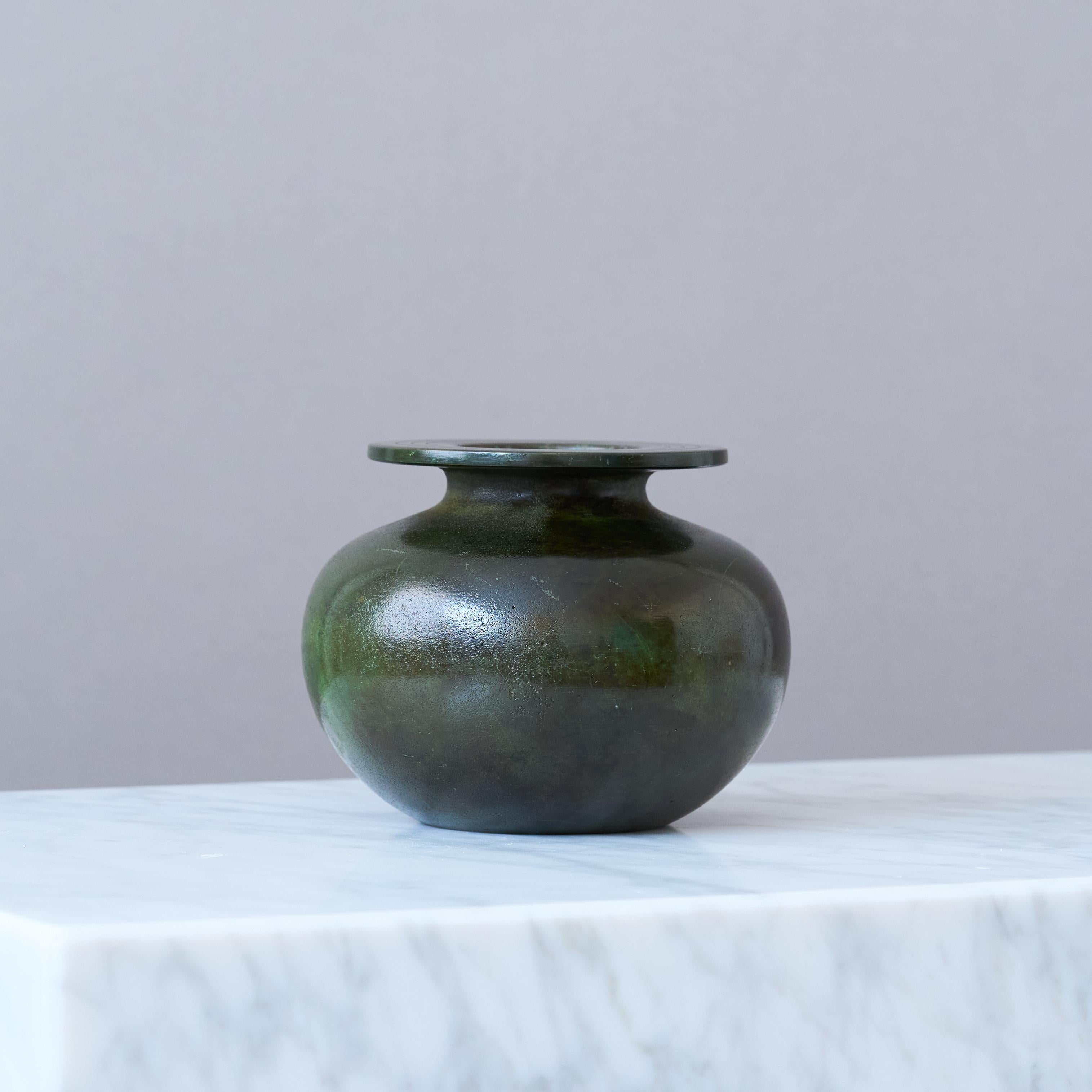 A beautiful bronze vase with amazing patina. 
Made by GAB Guldsmedsaktiebolaget, Sweden, 1930s.  

Good condition, some light scratches, scuffs and wear to the patination.  
Stamped 'BRONS' and makers mark.

GAB was founded in Stockholm in 1867 and
