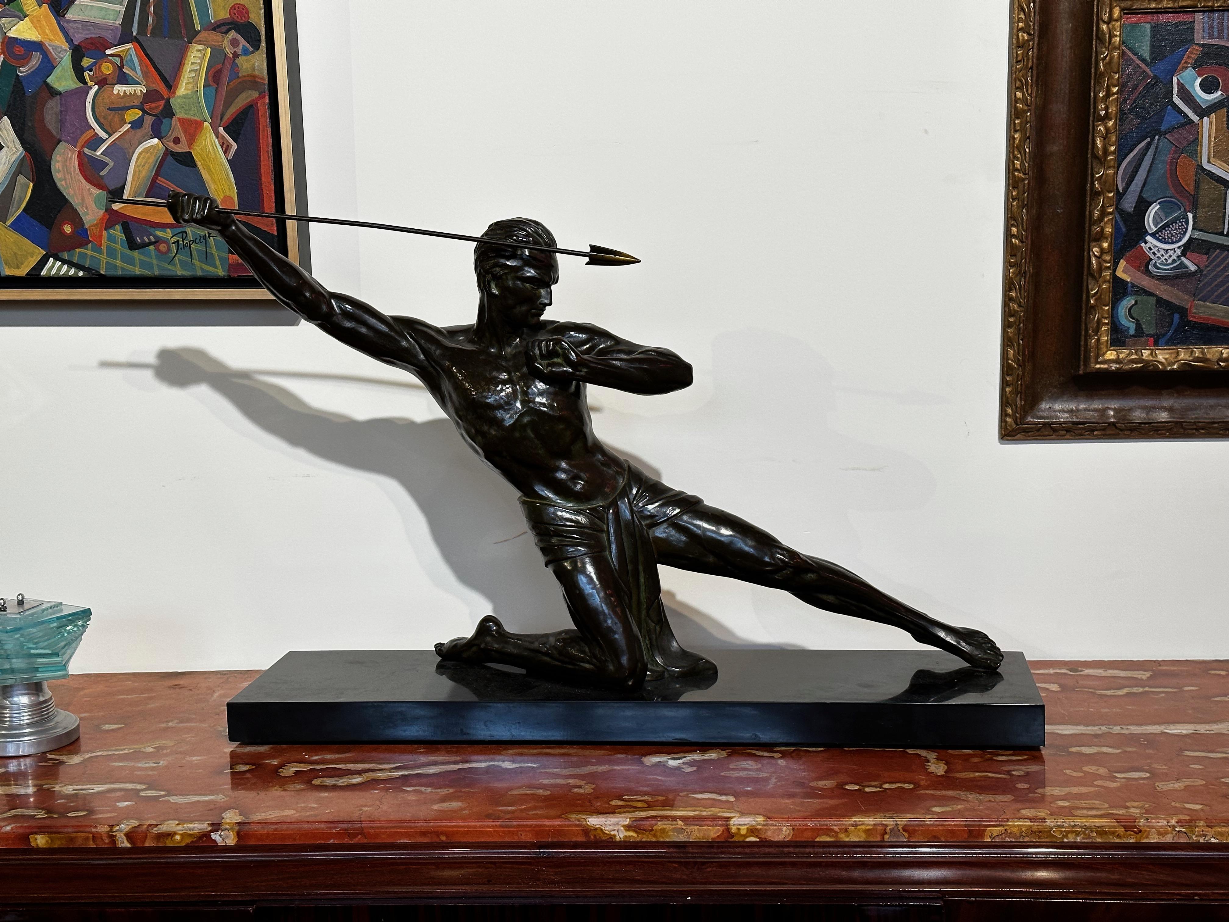 Large original bronze by P. Hugonnet signed on the marble, it is depicting the classic javelin thrower. This is a very well-detailed and quite intense figure. Look at his face, his hands, his muscular formation. Many of these classic athletic poses