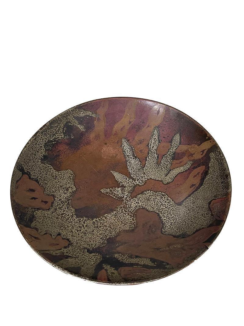 Art Deco bronze WMF Ikora wall plate by Paul Haustein, 1920s

An Art Deco bronze patinated wall plate by Paul Haustein for WMF Ikora, Germany, late 1920s
The plate has a small cut in the rim and traces of use, such as scratches and small dents.