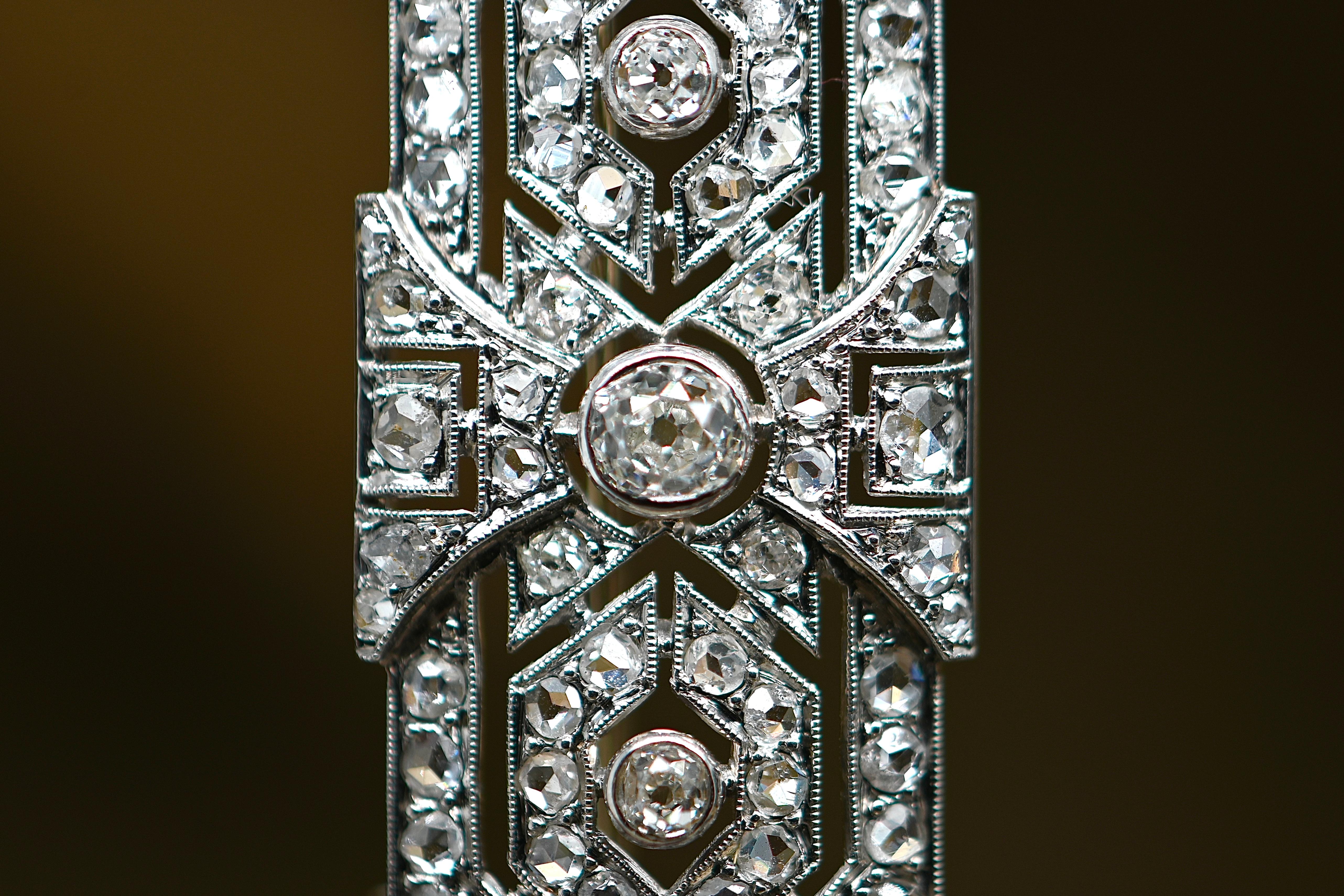 Antique Cushion Cut Art Deco Brooch Adorned with 3.01 Carat Diamonds And Platinum For Sale