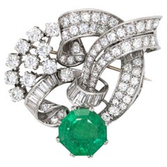 ART-DECO Brooch Platinum GIA Certified 9.77 Carat Emerald & Diamond Scroll.