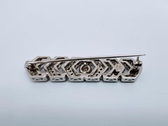 Broche moderne en or blanc 18 carats avec diamants