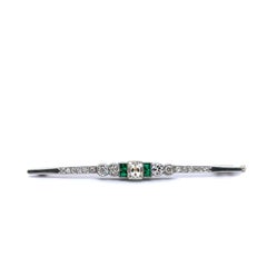 Art Deco Brooch with Old Cut Diamonds and Emeralds in 18 Karat Gold