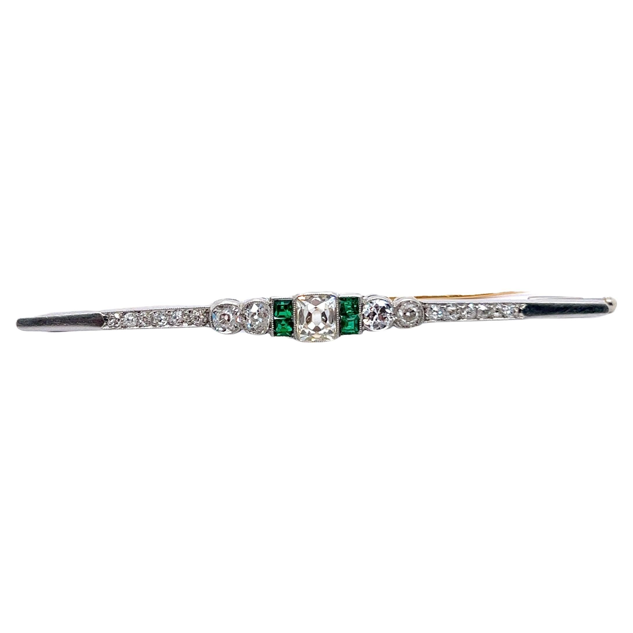 Art Deco Brooch with Old Cut Diamonds and Emeralds in 18 Karat Gold For Sale