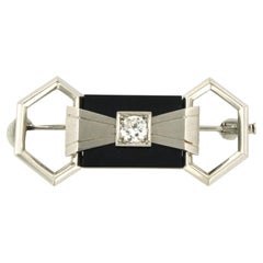 ART DECO Brooch with onyx and diamonds 950 platinum