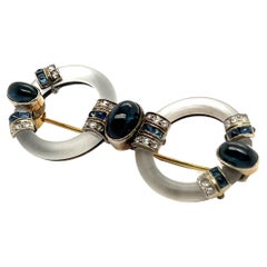 Antique Art Deco Brooch with Rock Crystal, Diamonds and Sapphires in 14K Yellow Gold