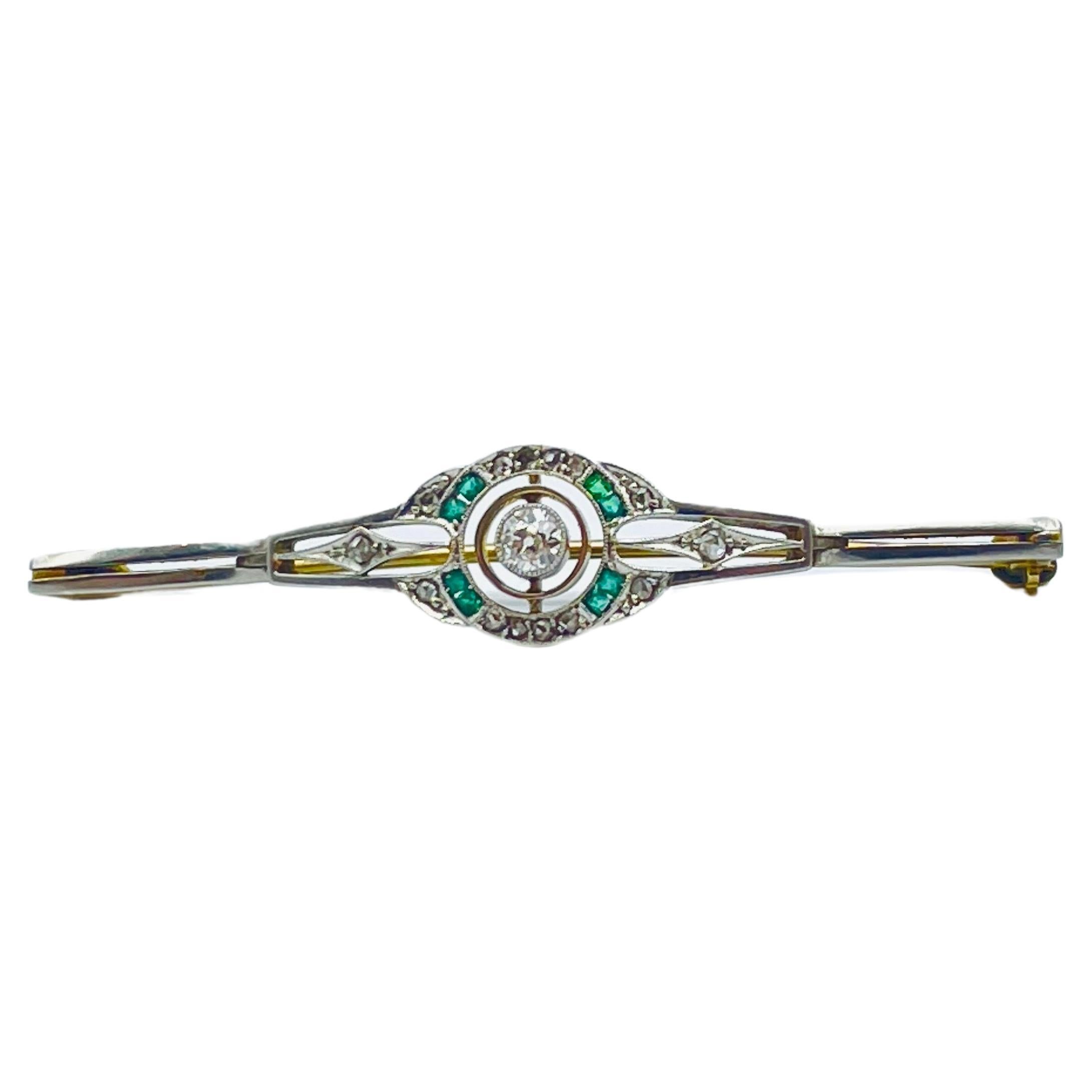 This enchanting Art Deco brooch is a masterpiece that seamlessly combines the rich warmth of yellow gold with the timeless elegance of white gold in a captivating bicolor embrace. It represents the pinnacle of craftsmanship, where every detail is