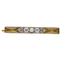 Antique Art deco Brooche with diamond and pearl in 14k bicolor 