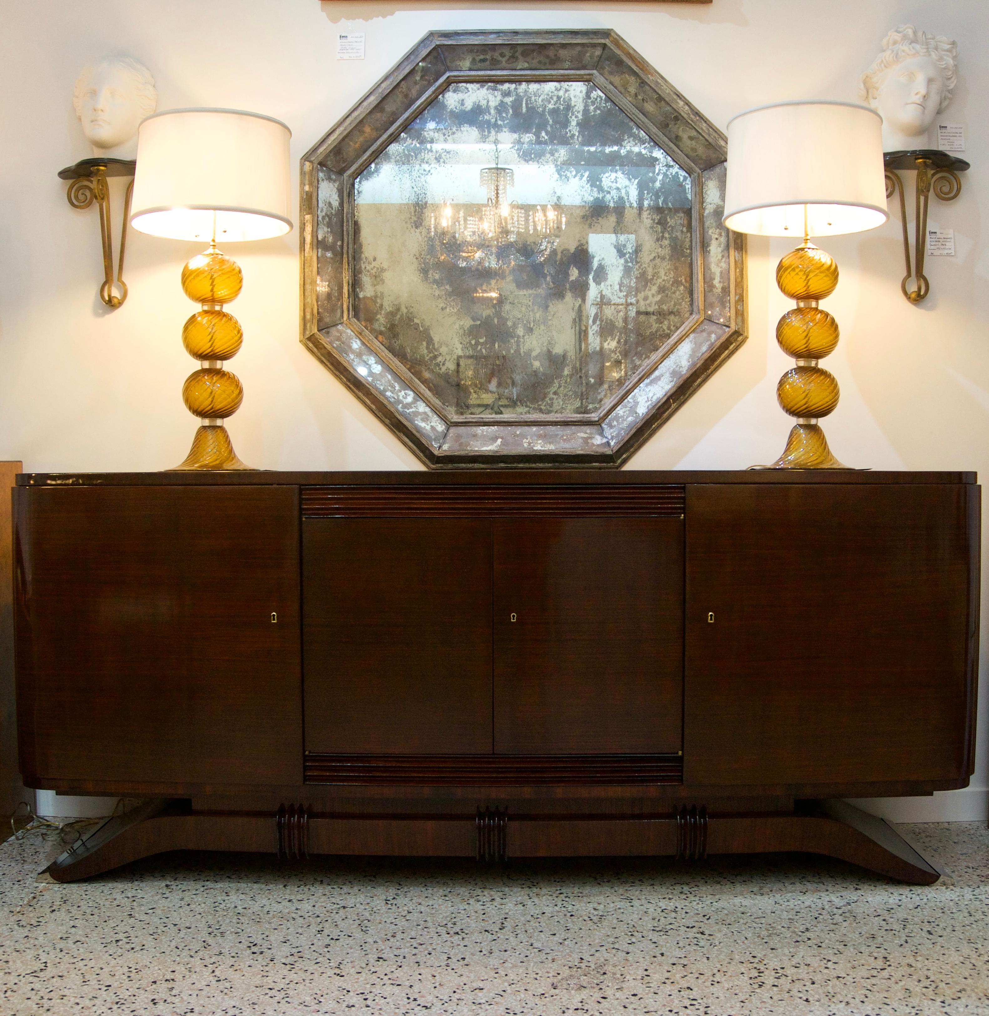 This stylish, chic and monumental scaled French Art Deco buffet was acquired from a Palm Beach estate and dates to the 1930s.

The piece has been professionally restored and will give you plenty of storage and definitely an impact piece.

 