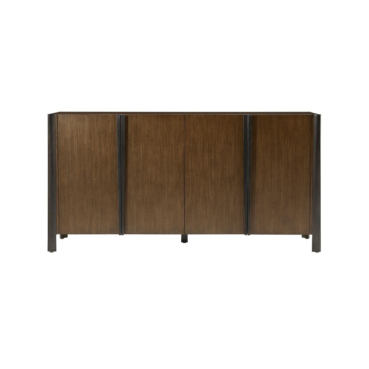  the four-door cabinet's design creates subtle motion, with elegantly tapering lines throughout. Crafted from Ash in our Gelato finish, the tapering Beech legs add contrast in our are complemented by the tapered brass hardware.

Fitted with two