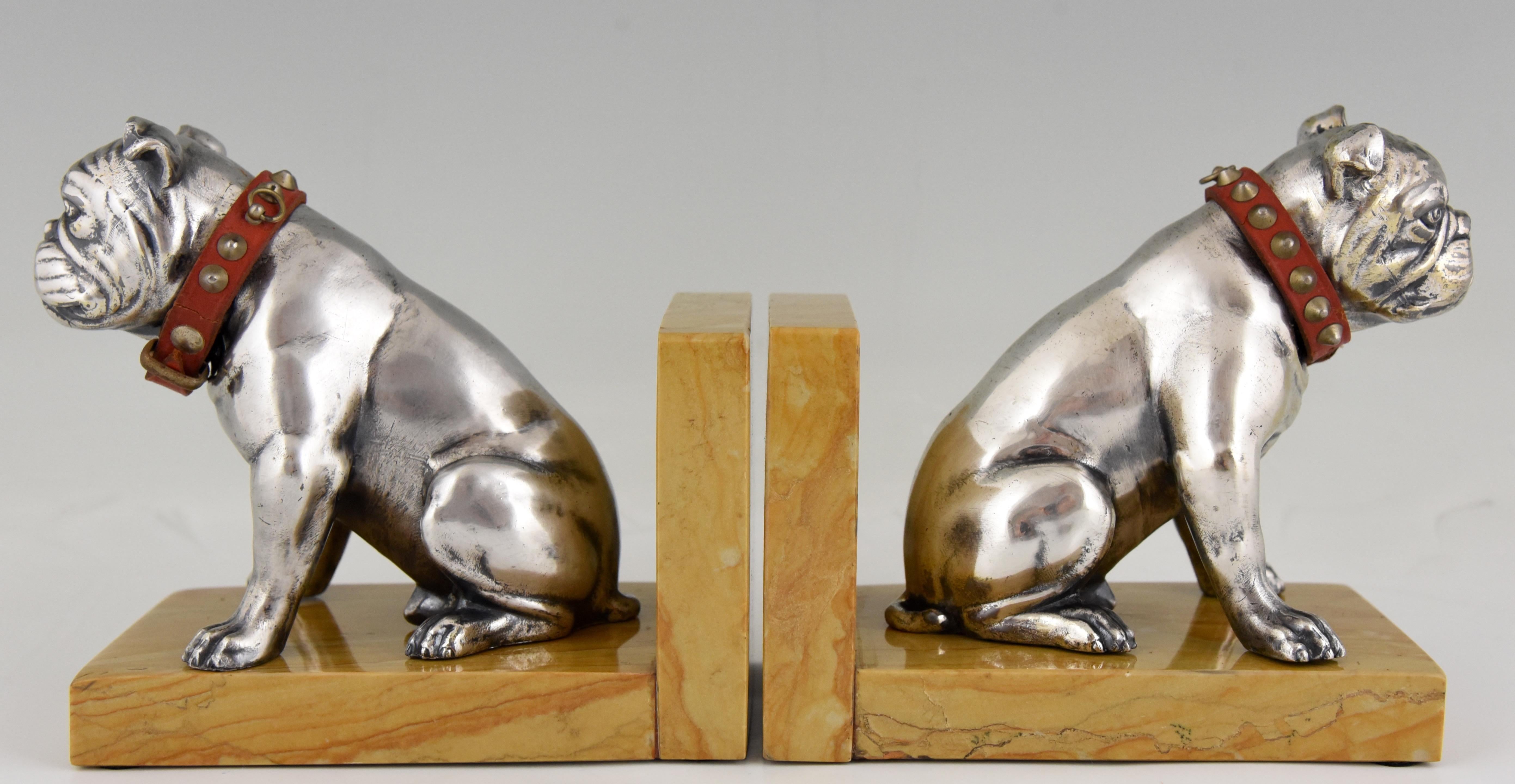 Cute pair of Art Deco bulldog bookends by Franjou, France 1930. White metal on marble base, leather collars with studs.