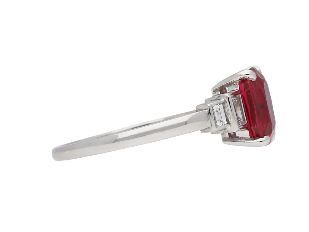 Art Deco Burmese red spinel and diamond ring. Set to the centre with one cushion shape old mine natural and unenhanced Burmese red spinel in an open back claw setting with an approximate weight of 1.80 carats, further set with four rectangular