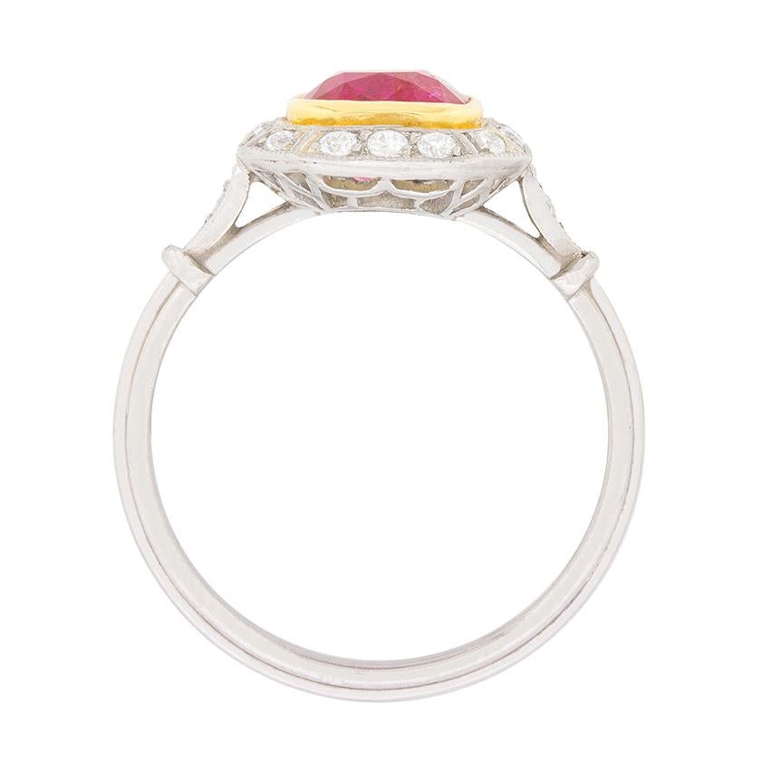 This beautiful ring dates back to the 1930s and features a wonderfully deep red ruby in the centre. The ruby has been certified by GIA as a natural stone with no treatment. The origin has been classed as Burmese, which shows the stone is top