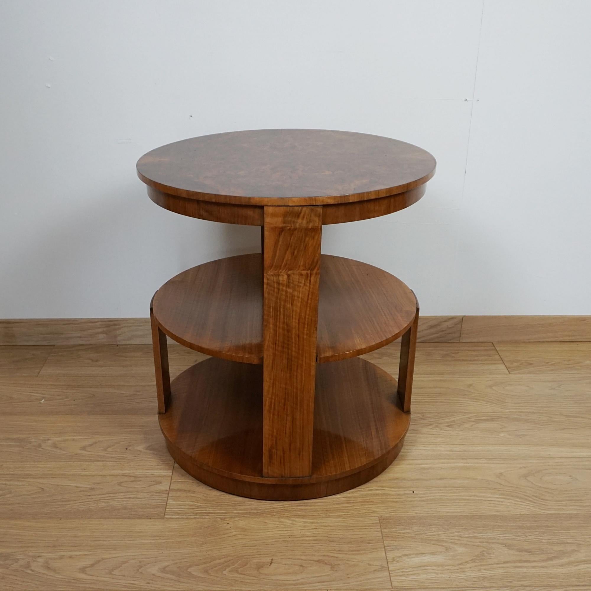 An Art Deco Library Table attributed to Heal's of London. Burr walnut veneered top with figured walnut banding.


