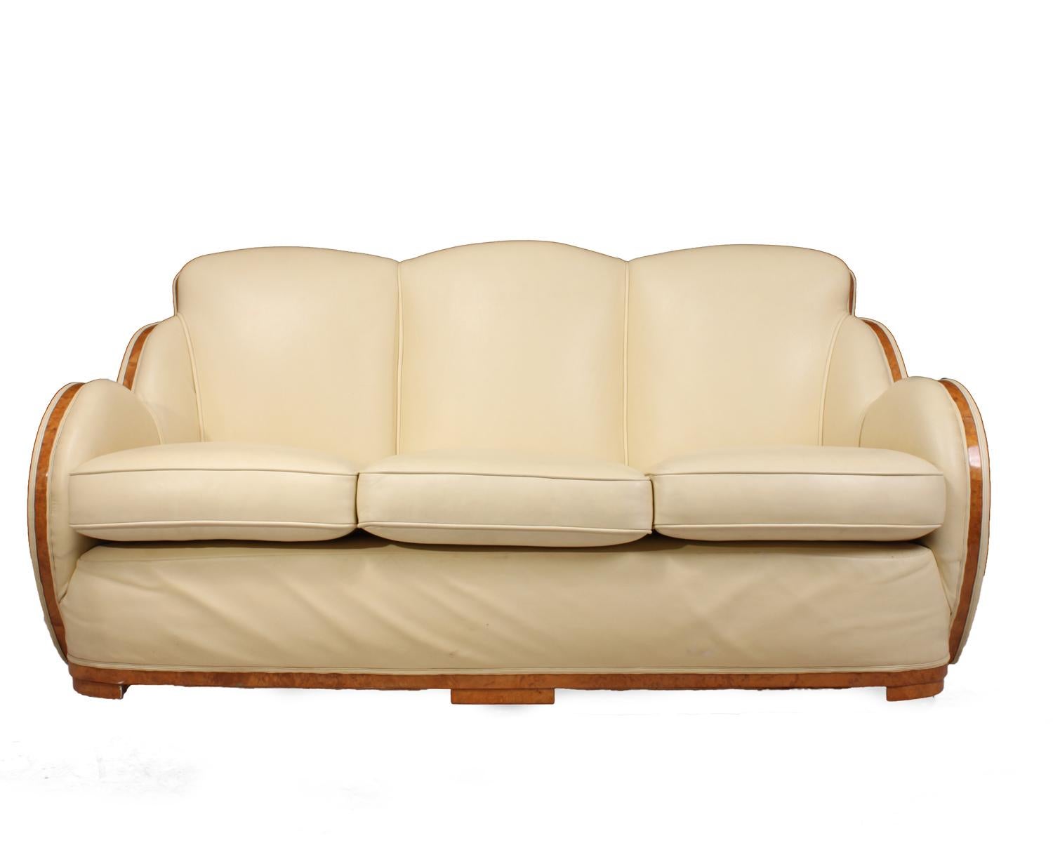 Art Deco burr maple and leather cloud suite by Epstein circa 1930
An Art Deco three piece suite by the well known London makers Harry and Lou Epstien, fully upholstered to a very high standard a few years ago and had very little use the show wood