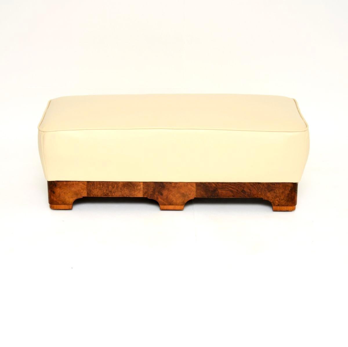 A stunning Art Deco burr walnut and leather stool. This was made in England, it dates from the 1930’s.

This is of superb quality, it is a lovely and very useful size. It would be perfect for an entry way, at the foot of a bed or in various other