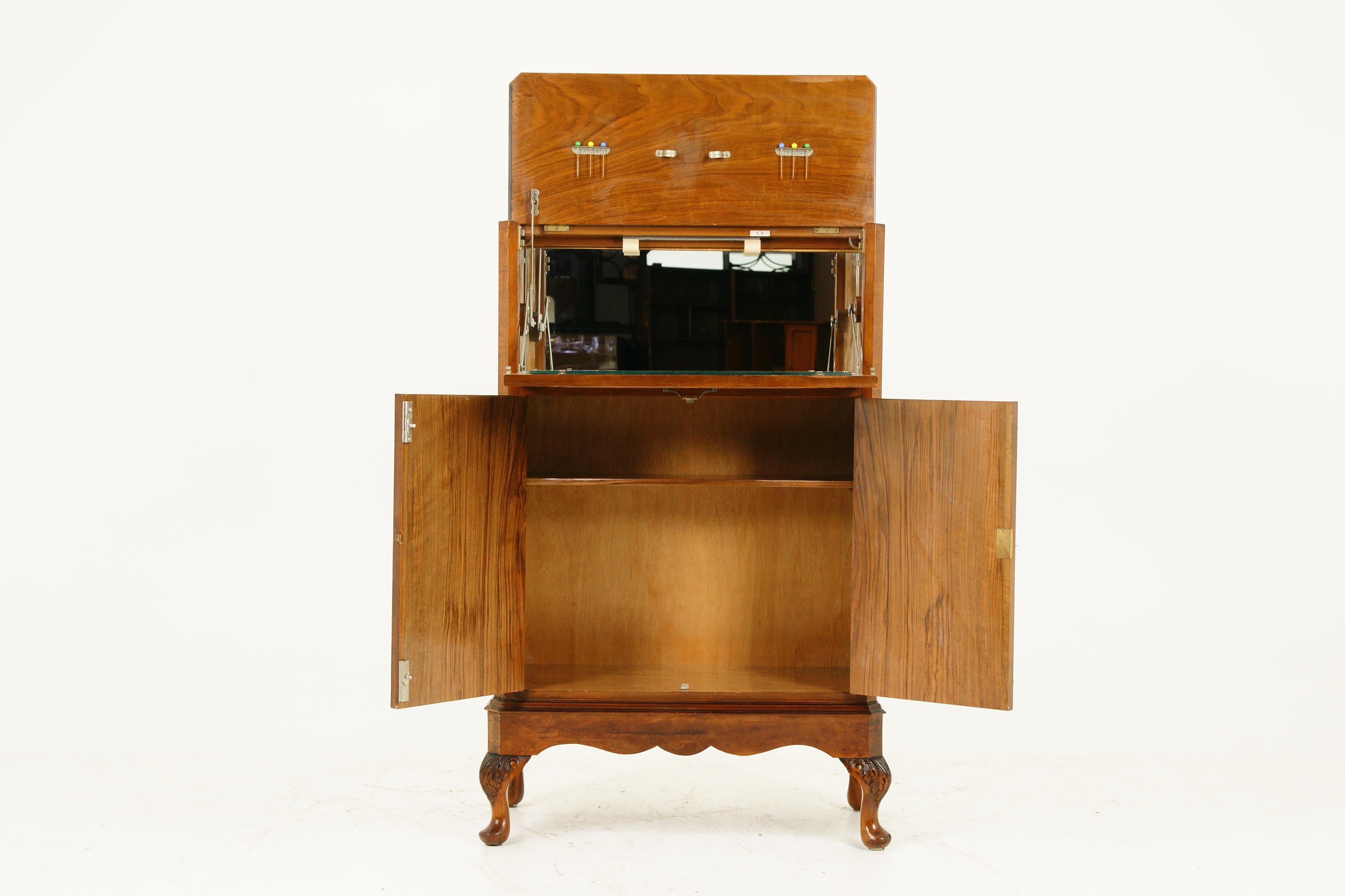 Art Deco burr walnut cocktail cabinet, drink cabinet, Scotland 1930, B1649 

Scotland, 1930
Solid walnut veneer
Original finish
Rectangular burr walnut top
When the fall front is pulled down it activates the top which raises it into an upright