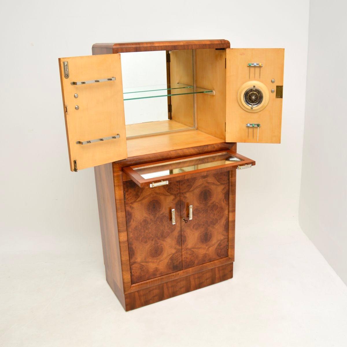 An absolutely stunning Art Deco burr walnut cocktail drinks cabinet, made in England and dating from the 1930’s.

This is of superb quality and is a lovely compact size. It is beautifully designed with absolutely gorgeous burr walnut grain patterns,