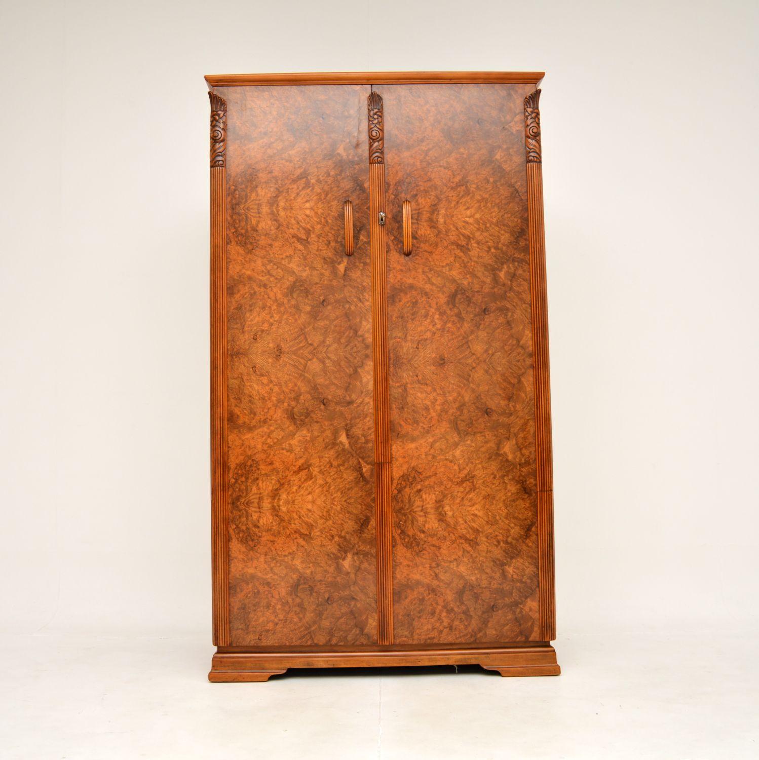 An absolutely stunning Art Deco burr walnut compactum wardrobe. This was made in England, it dates from the 1920’s.

It is of amazing quality and is a very useful size, it is not too imposing yet offers plenty of storage space. The burr walnut grain