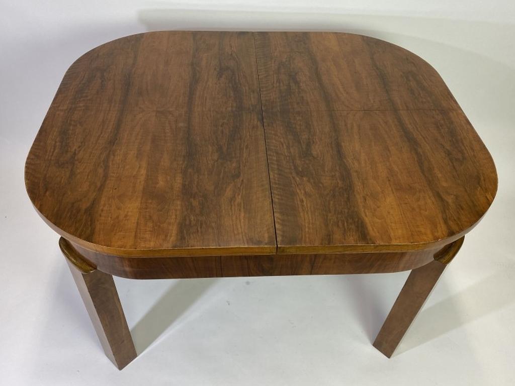 Art deco burr walnut dining table. Professionally stained and repolished.