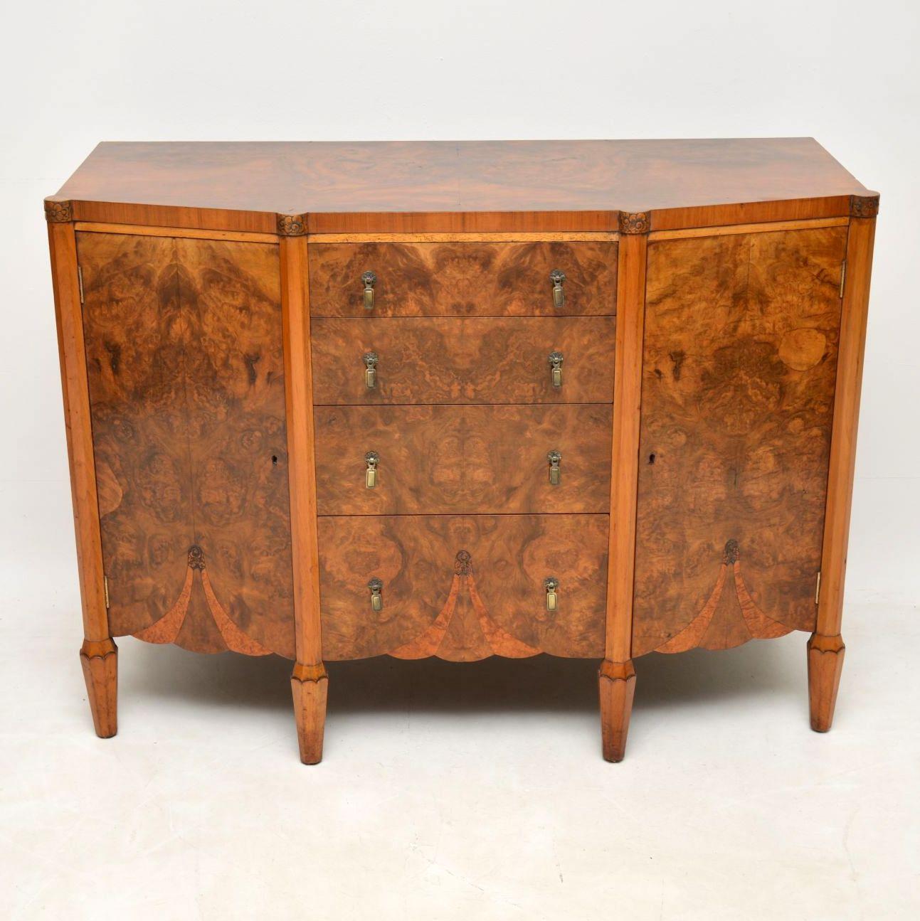 Original Art Deco burr walnut sideboard with a beautiful pattern within the veneers & of high quality. It’s in excellent condition, very stylish & a good solid practicable piece of furniture. It’s also small & compact, with plenty of storage in the