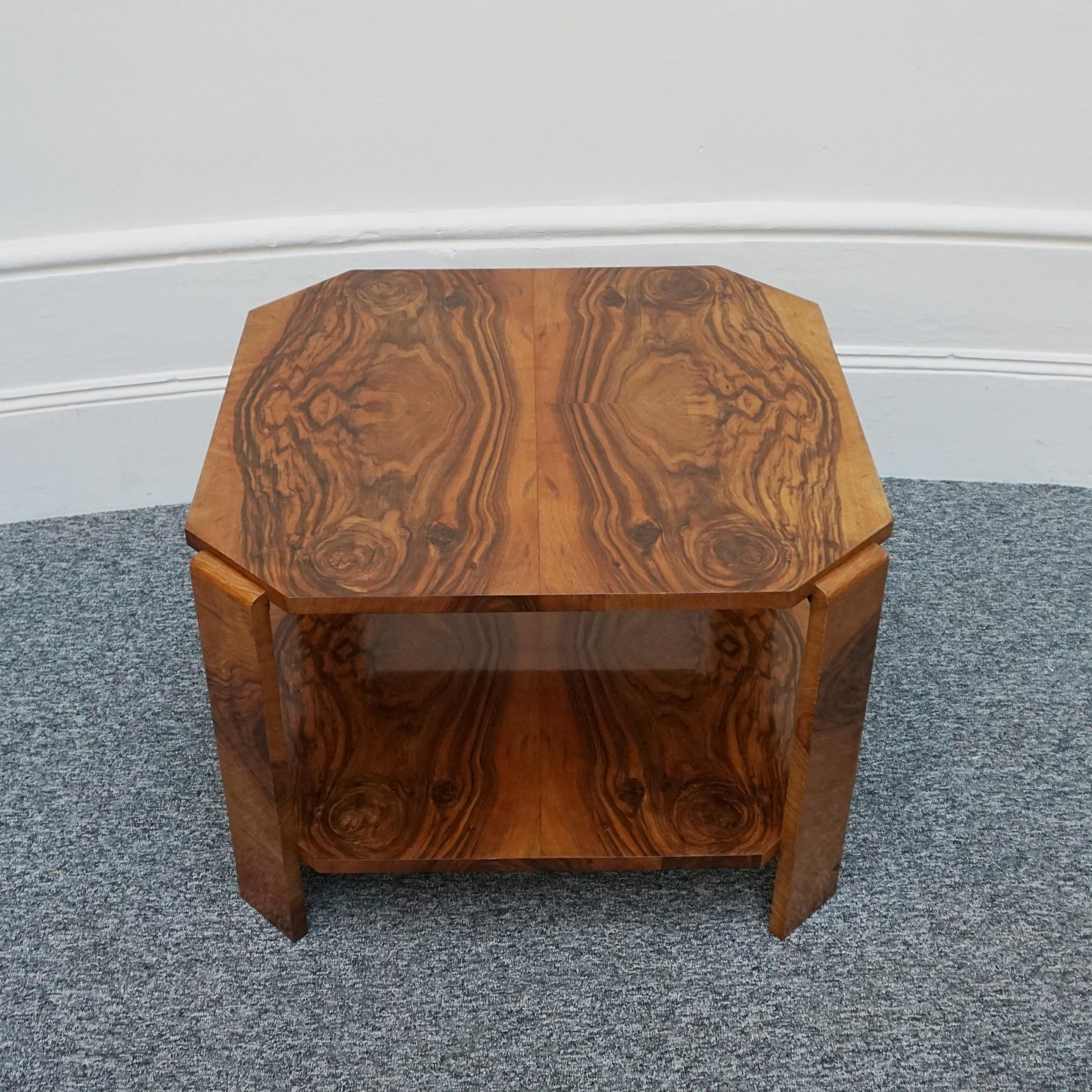 An Art Deco two-tiered side table. Burr walnut veneered on mahogany. 

Dimensions: H 48cm W 68.5cm D 68.5cm 

Origin: English

Date: Circa 1935 

Item Number: 2311234

All of our furniture is extensively polished and restored where necessary to the