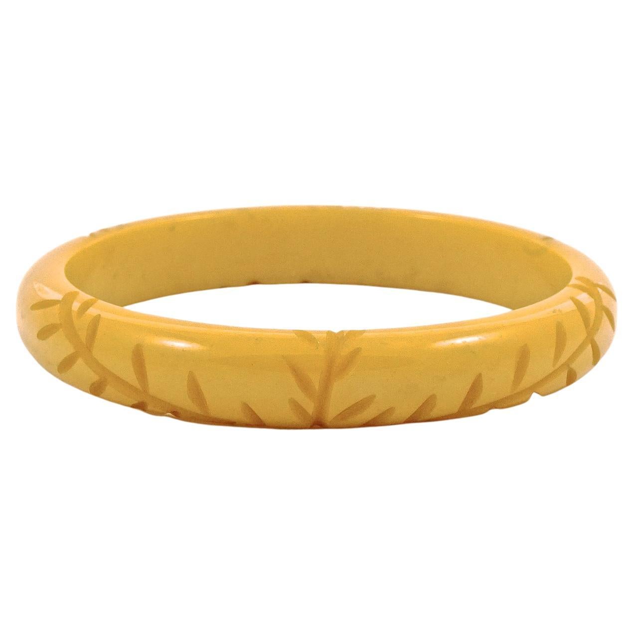 Art Deco Butterscotch Yellow Carved Leaves Bakelite Bangle For Sale