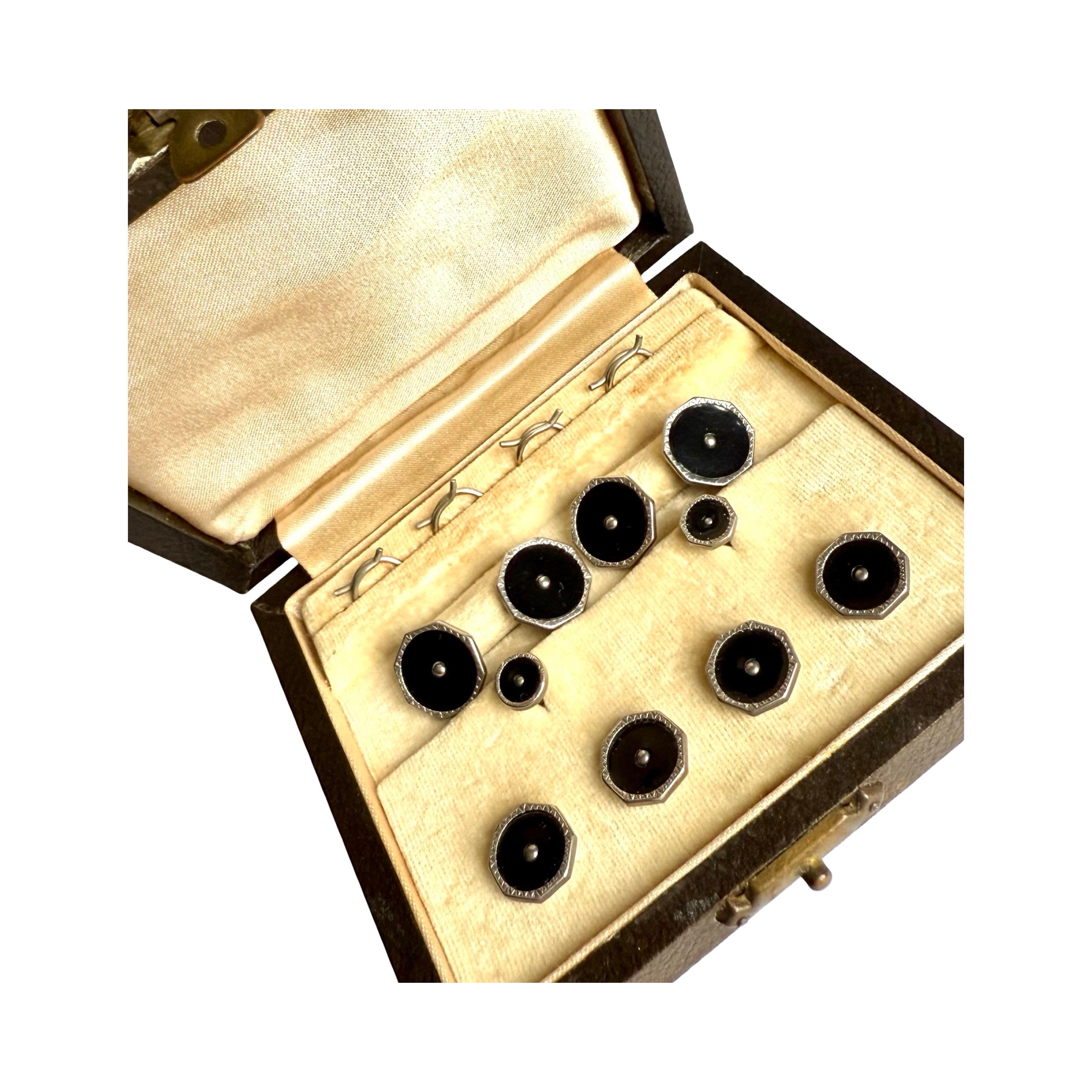 Stunning antique Art Deco gents studs or waistcoat buttons with matching cufflinks set in silver metal (not tested) in excellent condition. The inside of the box is in pristine condition, the cufflinks and buttons look as if they were never used.