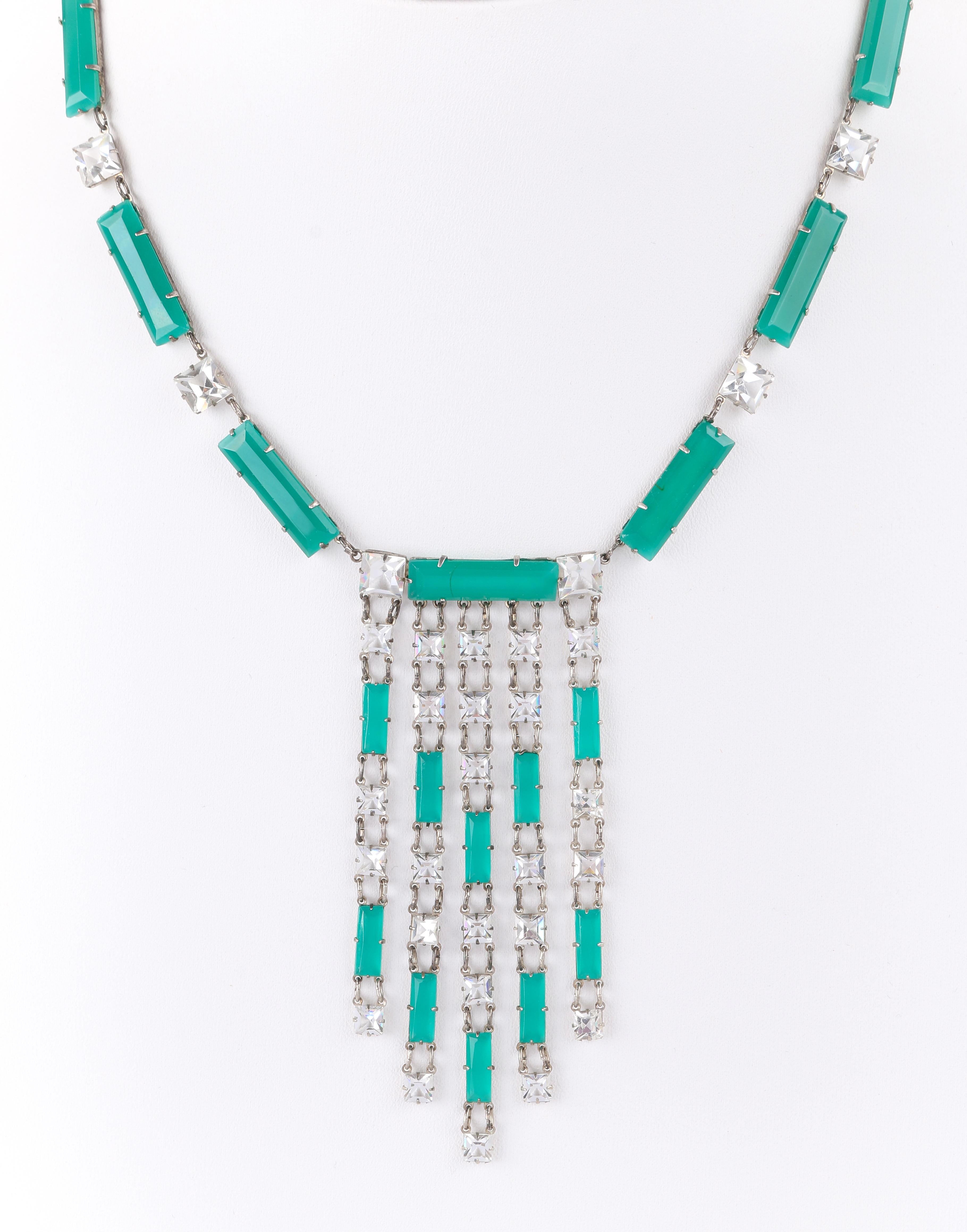 DESCRIPTION: ART DECO c.1920's Emerald & Clear Glass Sterling Silver Bib Pendant Necklace
 
Circa: c.1920’s
Markings: Sterling
Style: Fringe pendant necklace
Color(s): Shades of green, clear and silver
Marked Material: Sterling
Unmarked Material